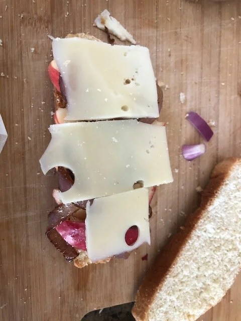 With the lAyer of cheese, try and thinly slice.
