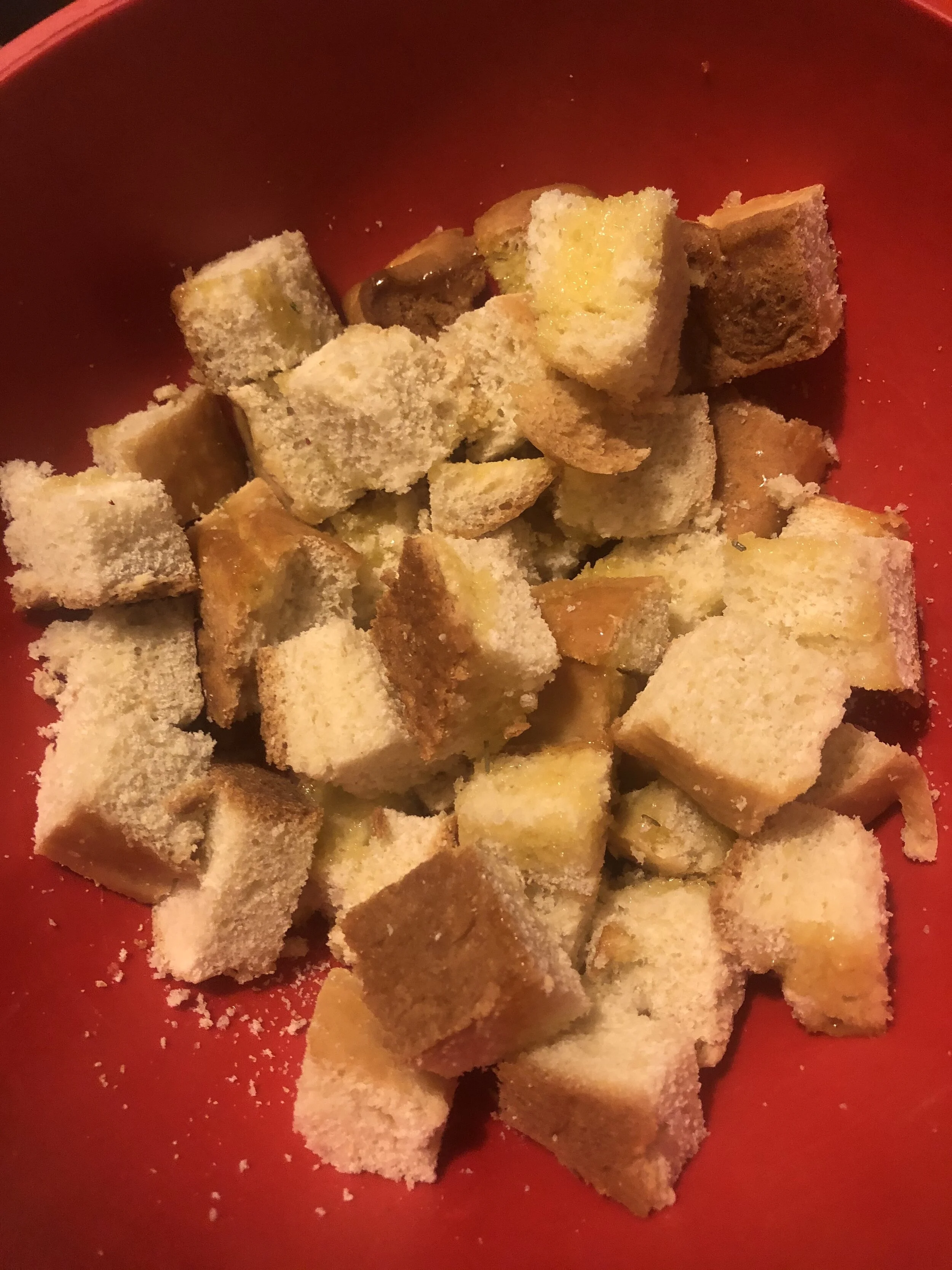 Cut the bread into cubes, which should be bite sized but substantial so they hold up to cooking.