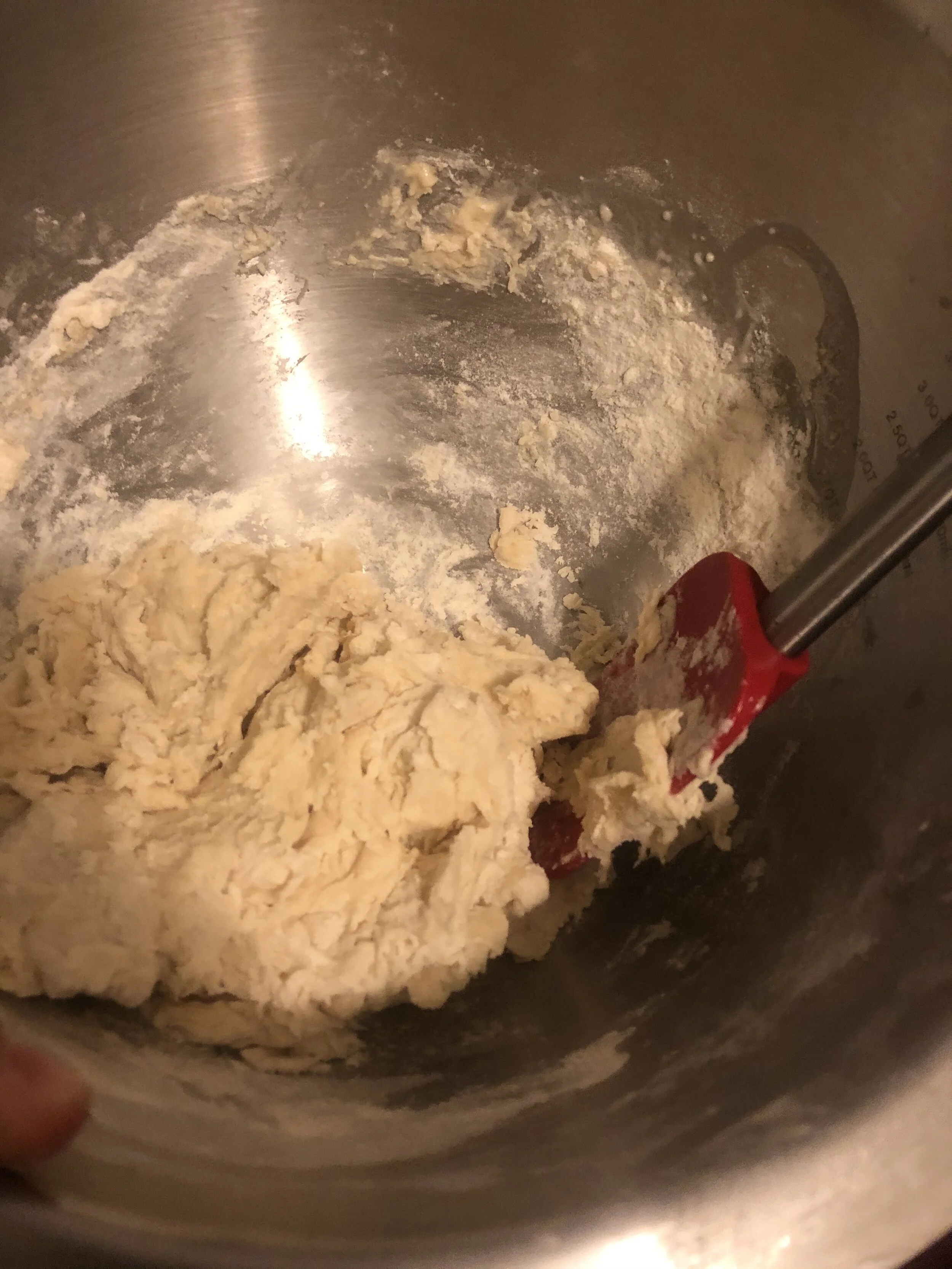 Proof the yeast by adding yeast, waTer and sugar to yoir medium bowl. Let them sit together until it becomes foamy and frothy.Add yoir olive oil and stir to iNtegrate.  add 2 cUps of flour and mix in your stand up mixer. Add the rEmaininG flour Care…
