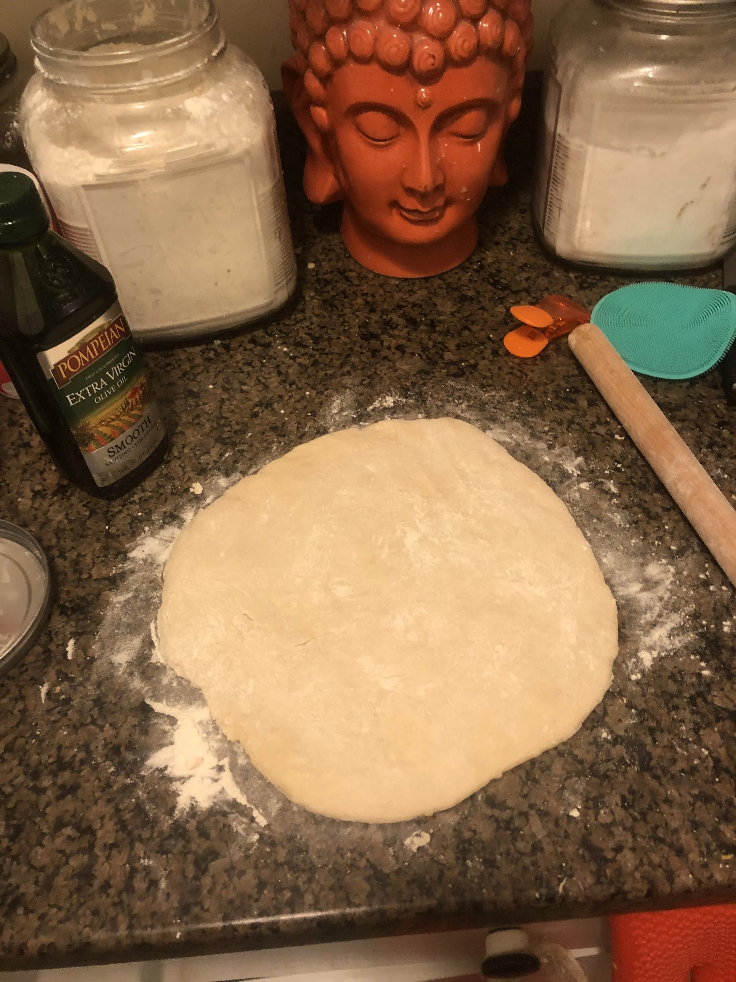 Roll your pizza crust until desired shape