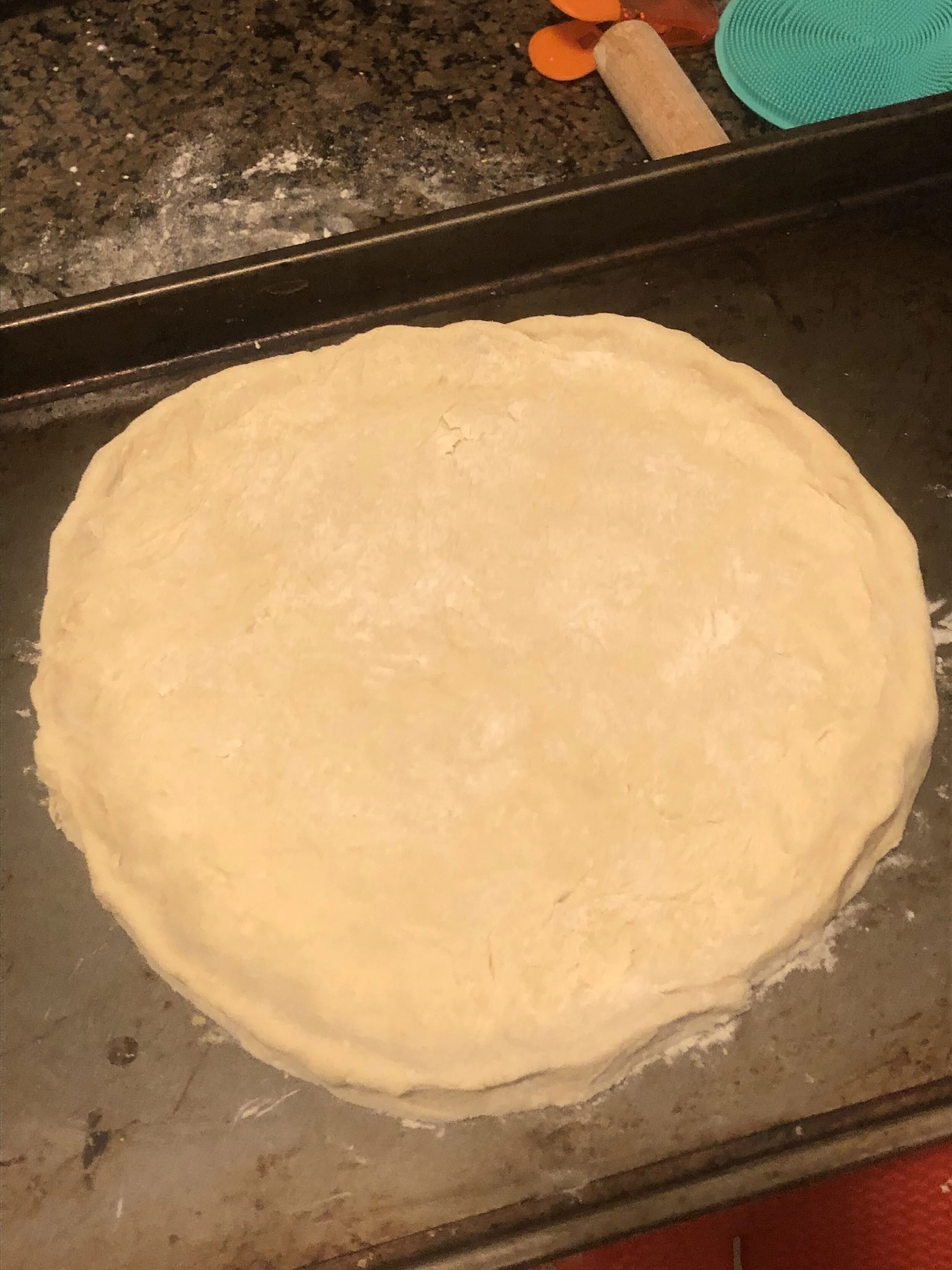 Using your fingers edge up tge sides to make crust and place on a greased cooking Sheet. Bake in the oven for 5-6 minutes.