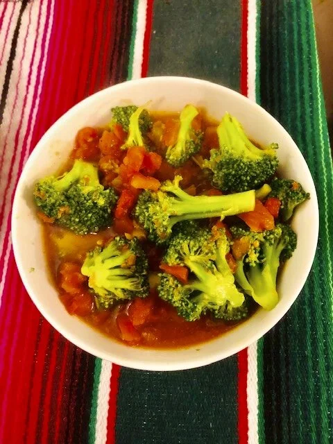 Bring a pot of salted water to boil.Add your broccoli and cook until it is vibrant green but not completely cooked.Drain the broccoli and put aside.Add the sofrito and can of tomatoes into your medium saucepan. Cook for 5-6 minutesAdd the broccoli, …