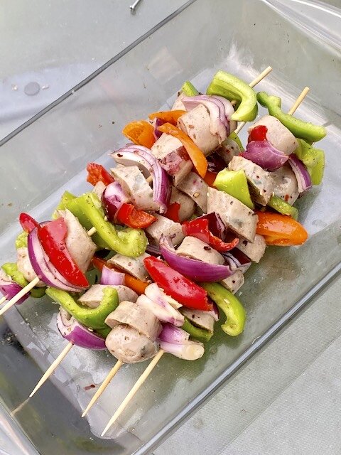 Prepared Sausages - Put on the skewers so each sausage coined is next to an onion on the front side and a pepper piece on the other.