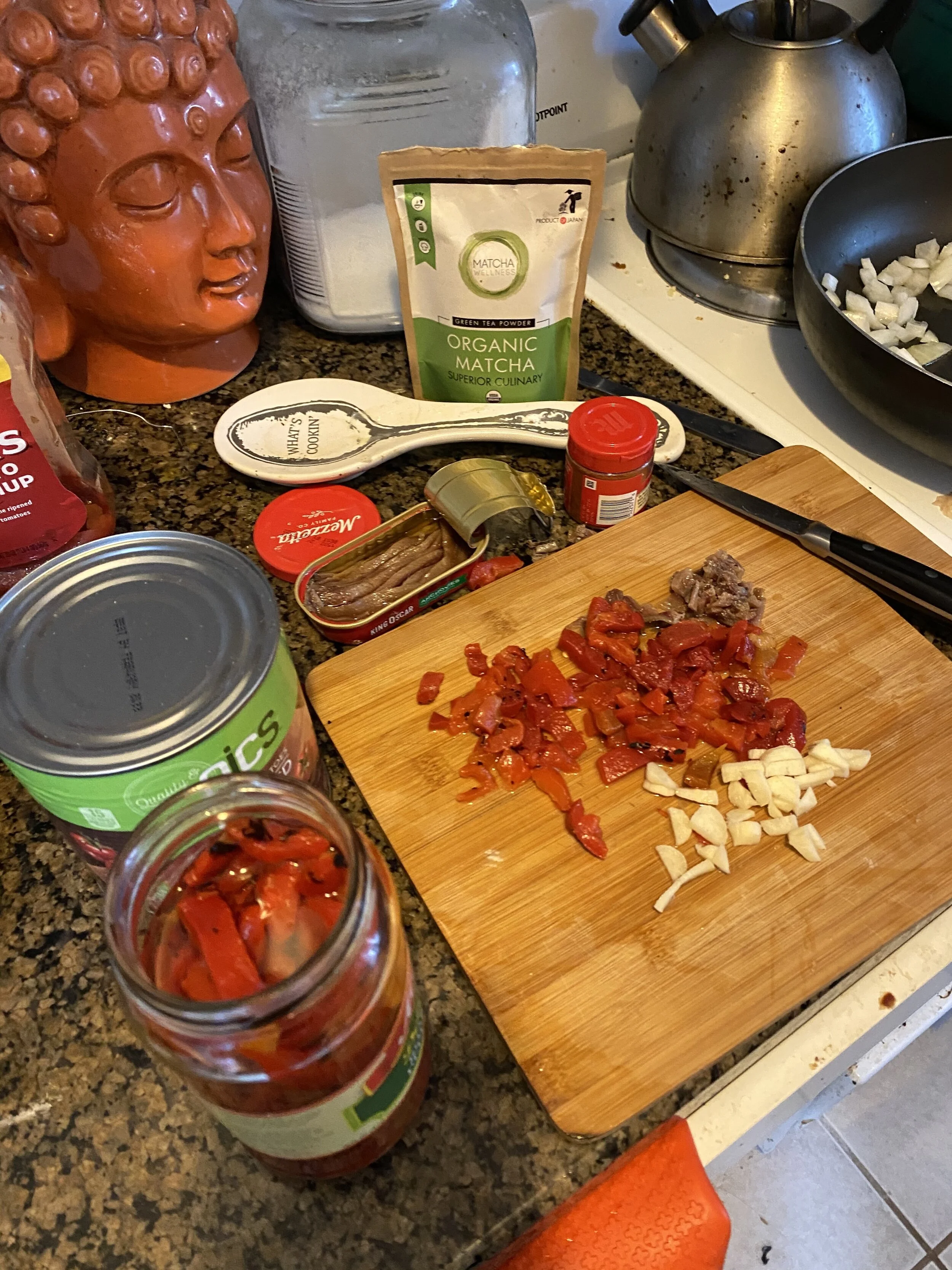 Add a tbls (or so) to your medium skillet and then add your diced medium onion. While it is cooking until aromatic, turn on your hood fan, dice your red peppers, garlic cloves, anchovy fIllets and then add to the skillet. Cook for 5-6 minutes (or mo…