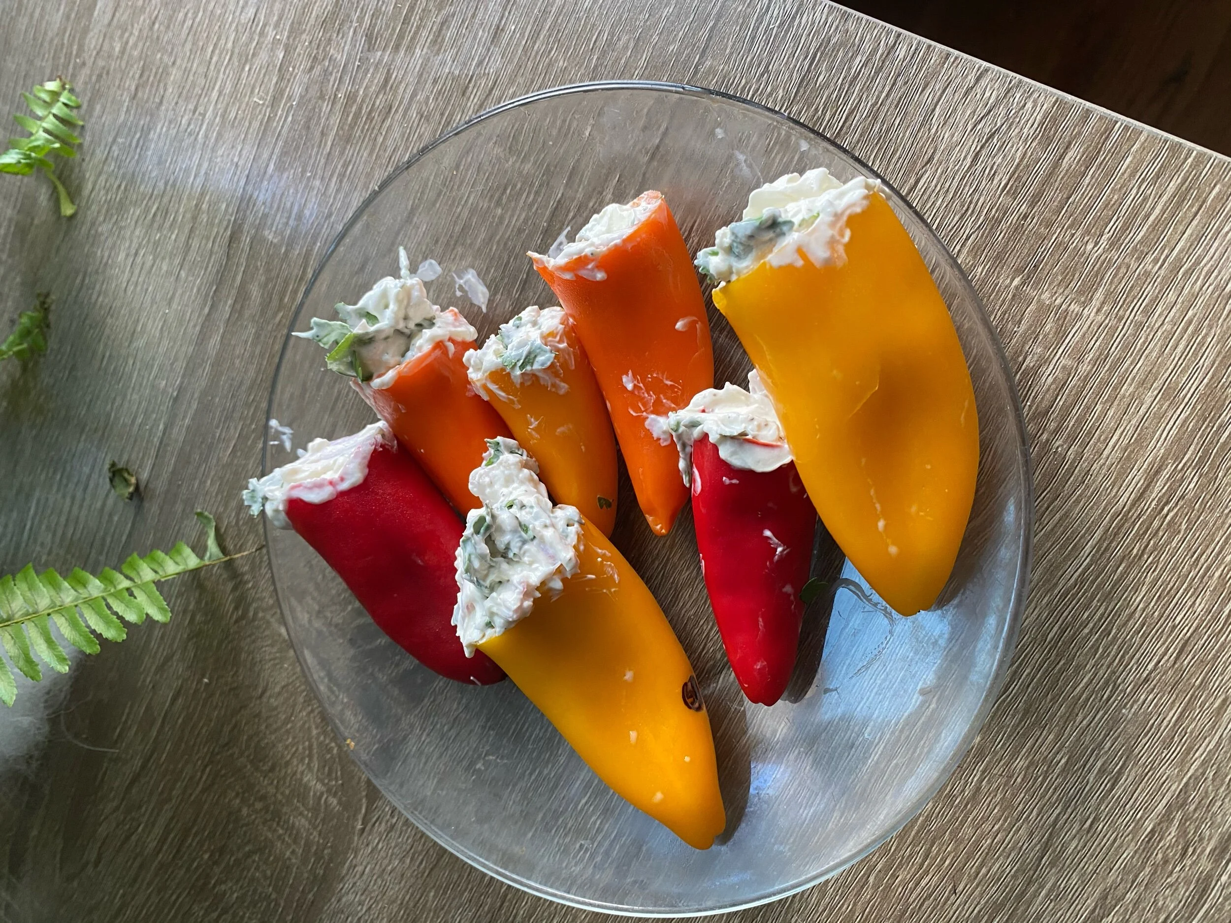 Using your knife, stuff the peppers with your cream cheese fIlling. Cover a refrigerate.