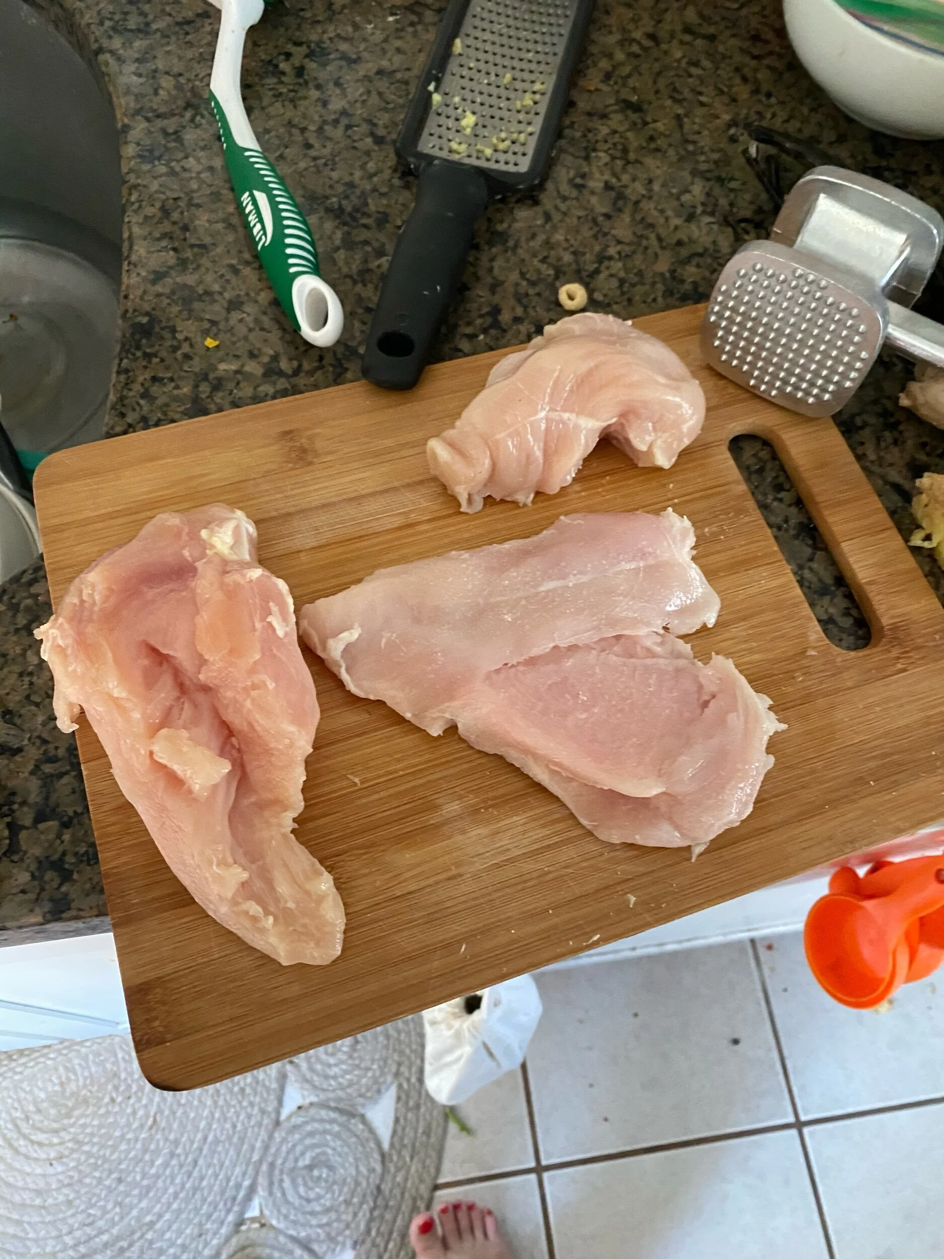 Clean the chicken of sinew and using your meat tenderizer, Make It an even WiDth.