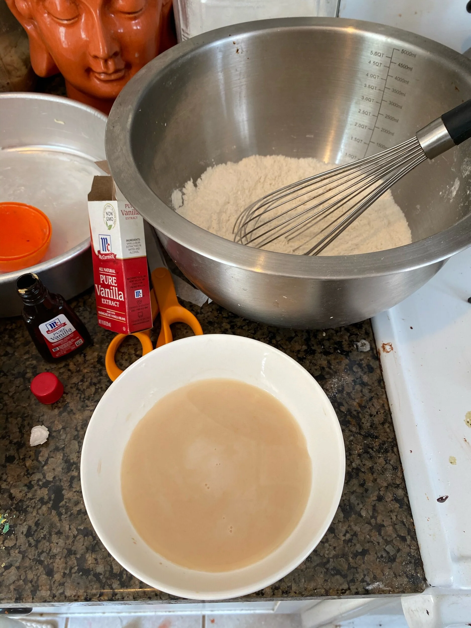 In a medium bowl, whisk together flour, baking powder, baking soda and salt. In a small bowl, stir together milk and vanilla.