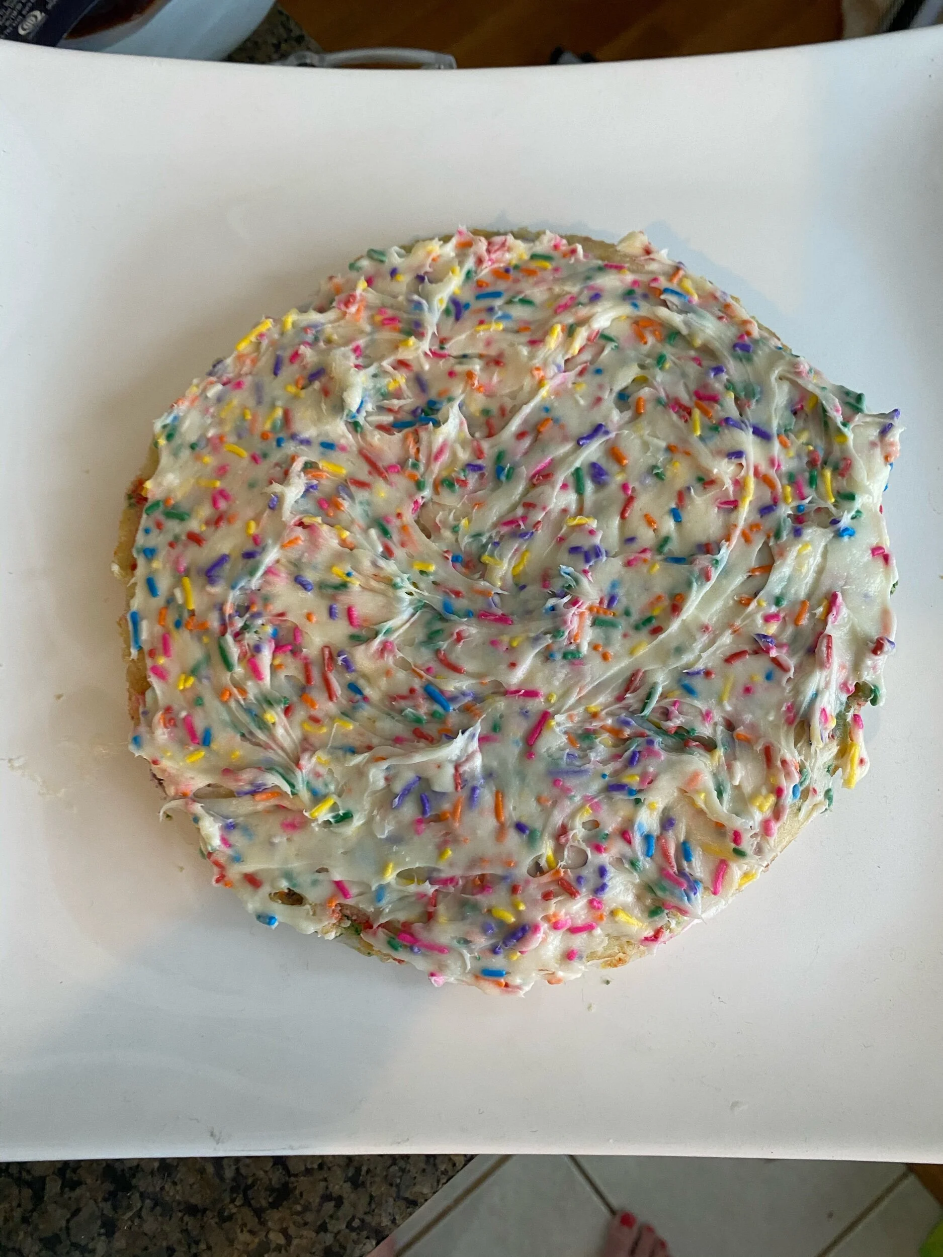 Cool the cake for at least 3 hours. Frost The bottom cake, place the second cake on top and frost together.