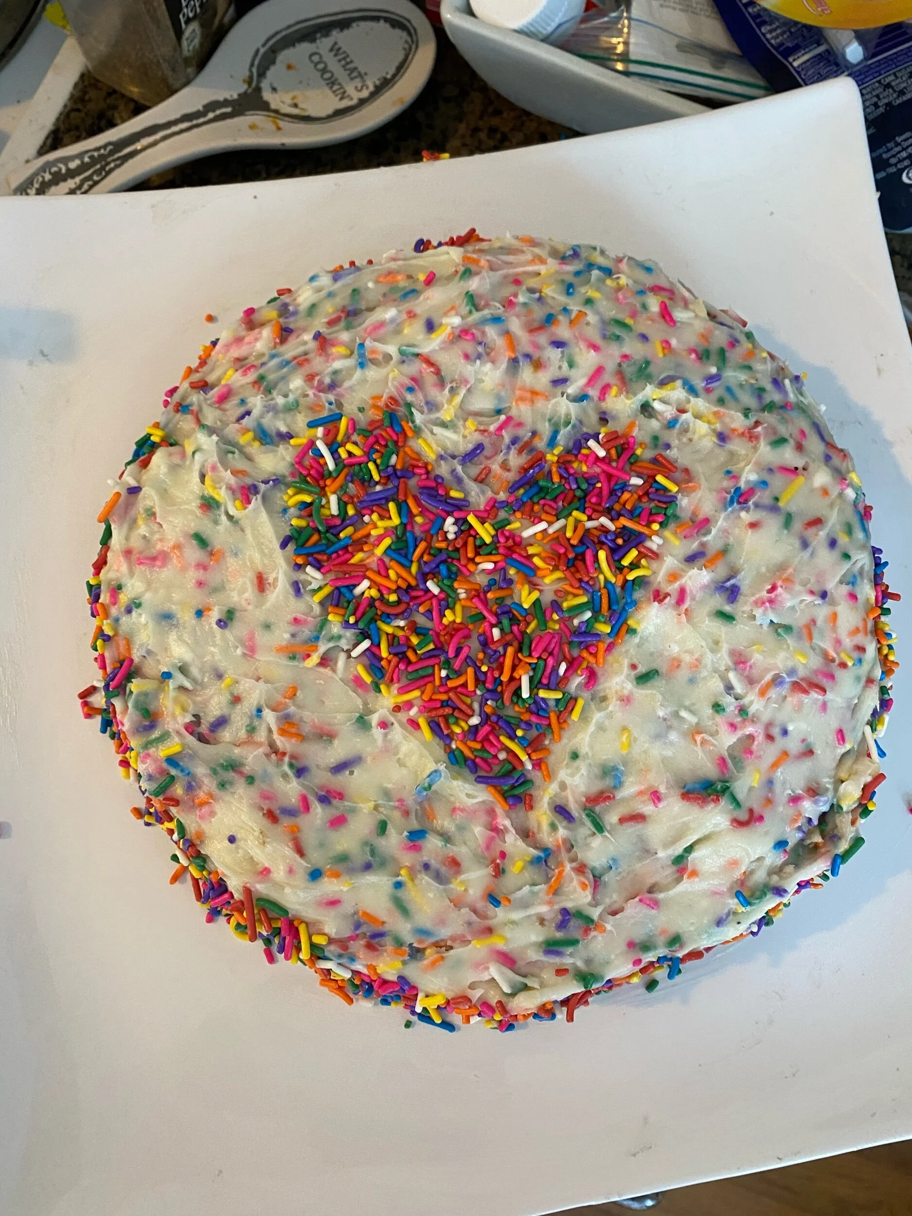 With yoir liberal hand, sprinkle sprinkles in the shape and carefully remove.