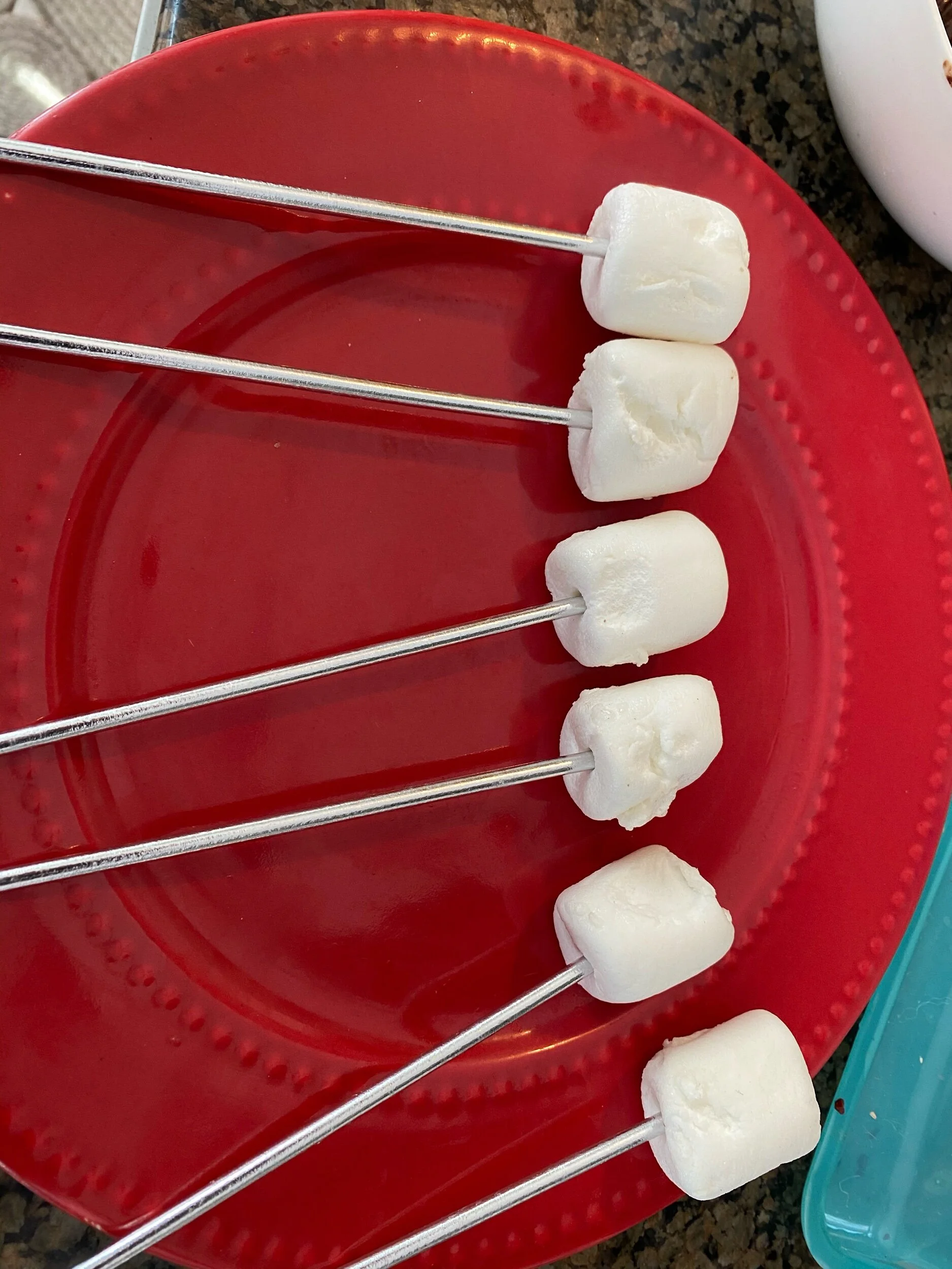 GentLy stick Your marshmallows on the sticks before you melt the chocolate