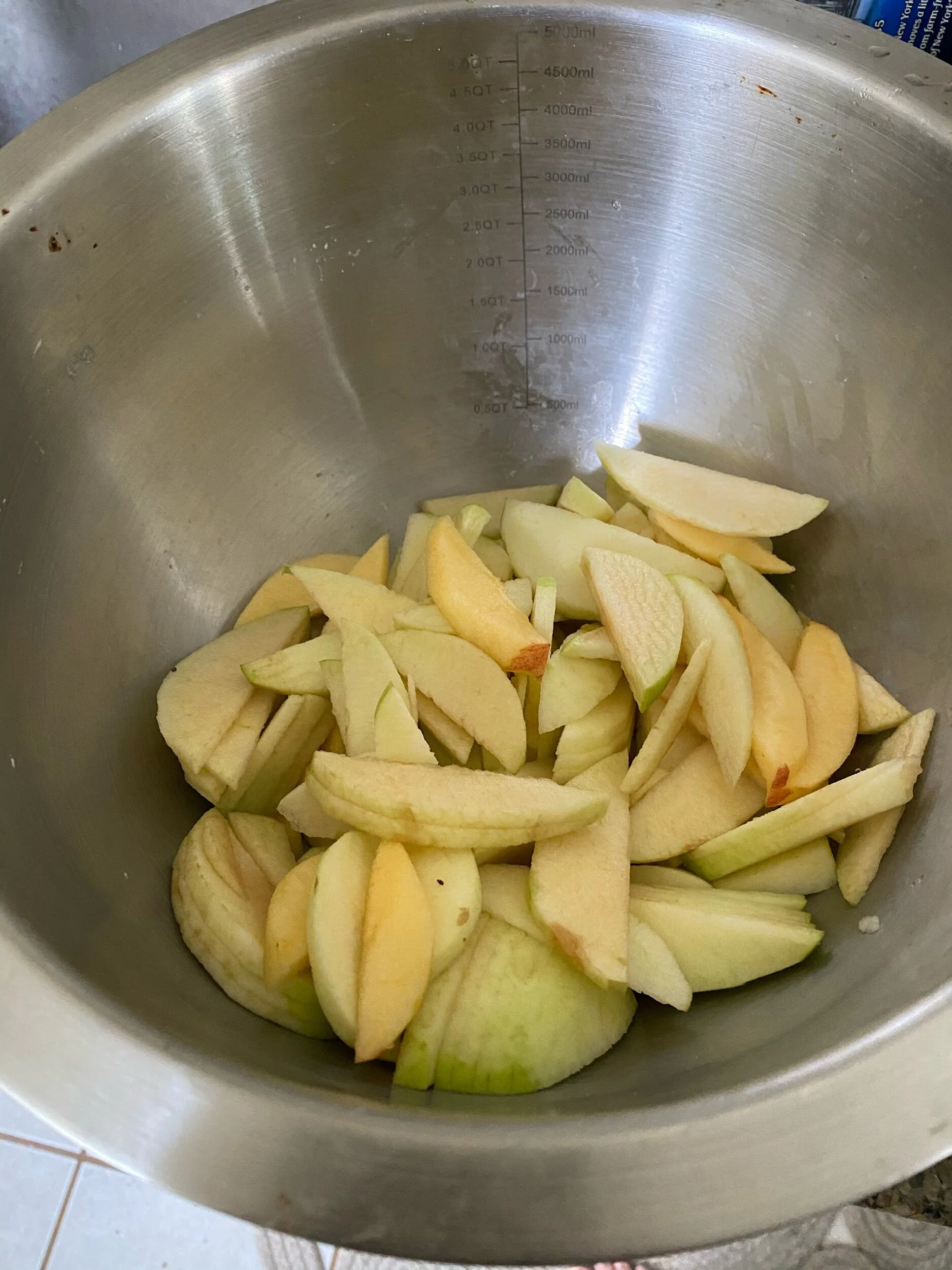 Preheat the oven to 390 degrees. Peel and cut your apple slices