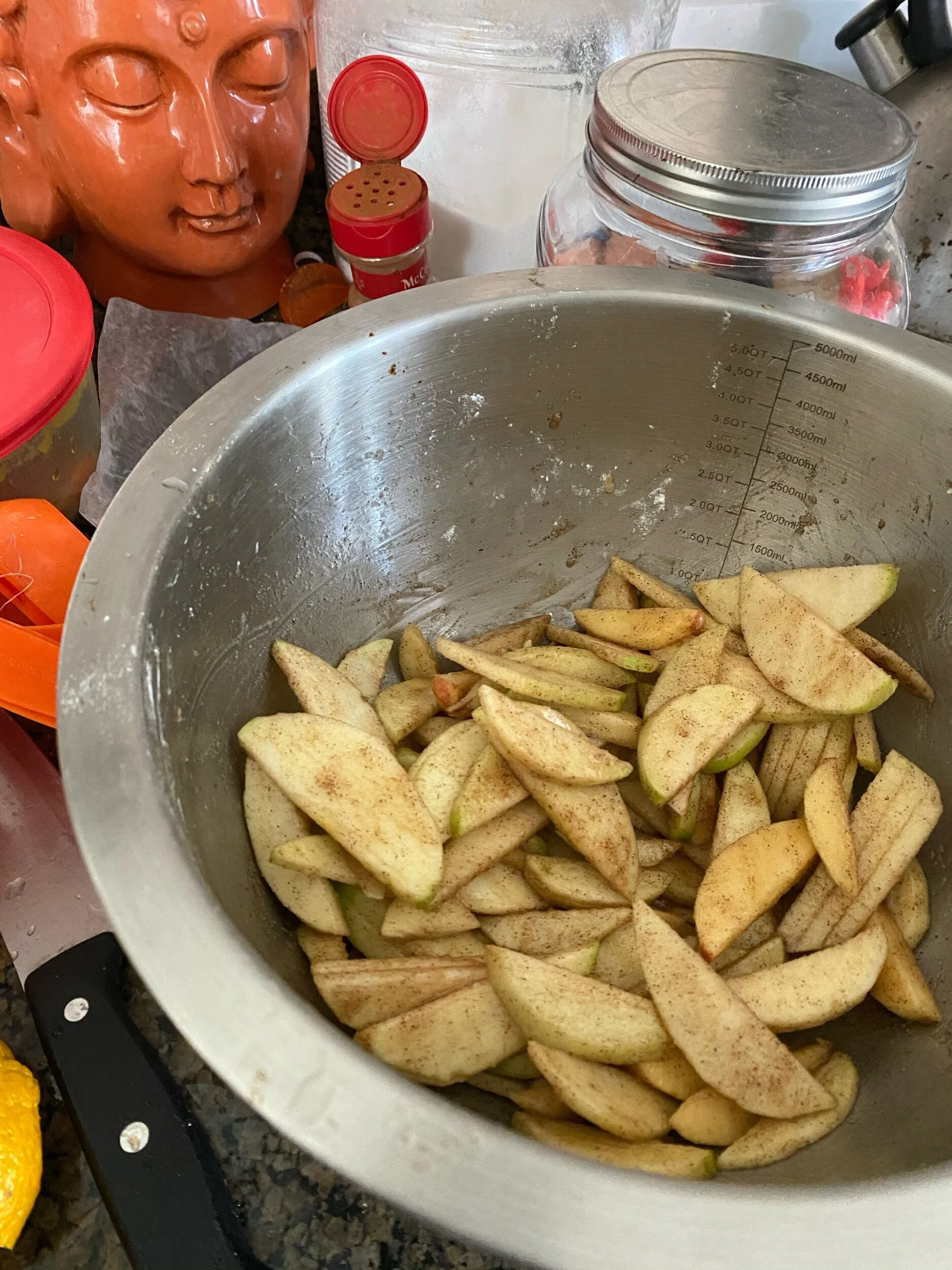 Toss your apples in the spices for the filling (including lemon juice)