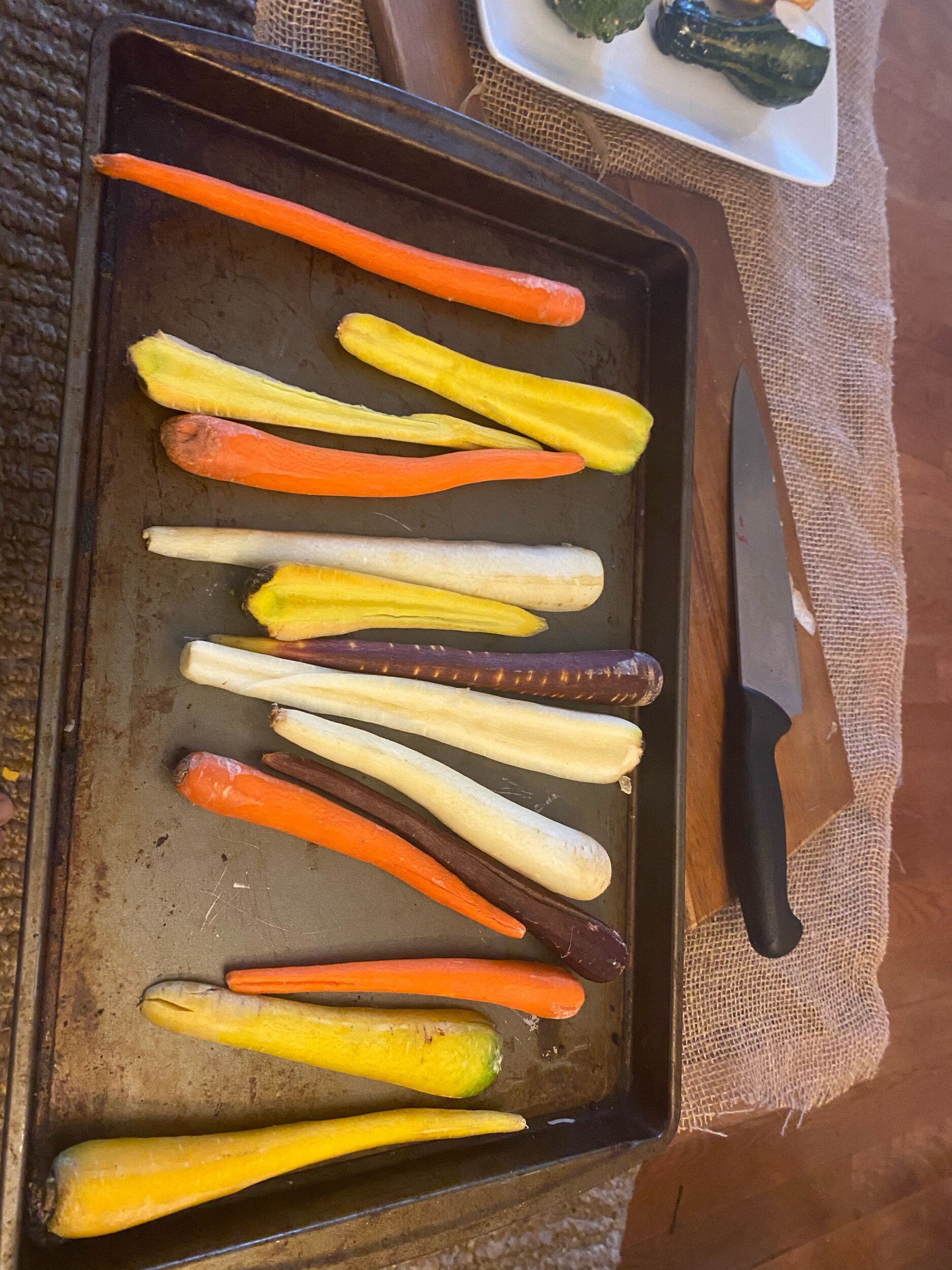 Preheat your oven to 375 degree. Peel your carrots and if they’re extraordinarily girthy, cut down the middle. Toss them with olive oil, salt and pepper and put on your baking sheet. Dice the Rosemary and liberally sprinkle over the carrots. Put the…