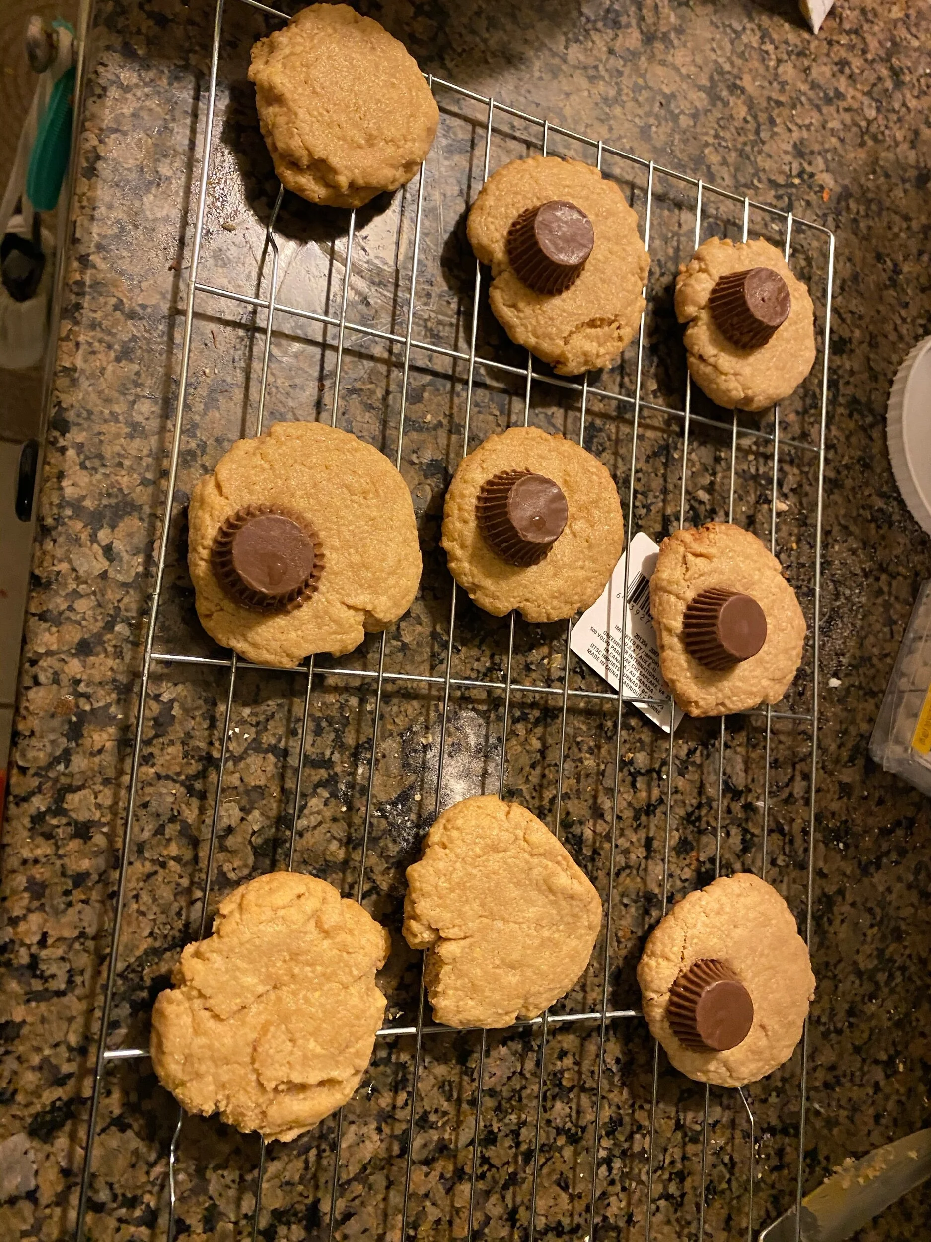 Remove cookies from sheet pan and put on a cookie rack. Mine is from the dollar store, even though in these times luxuries seem like things we cannot afford, buy yourself a dollar store cookie rack. Your mind will be blown fellow cookie bakers.  Rou…