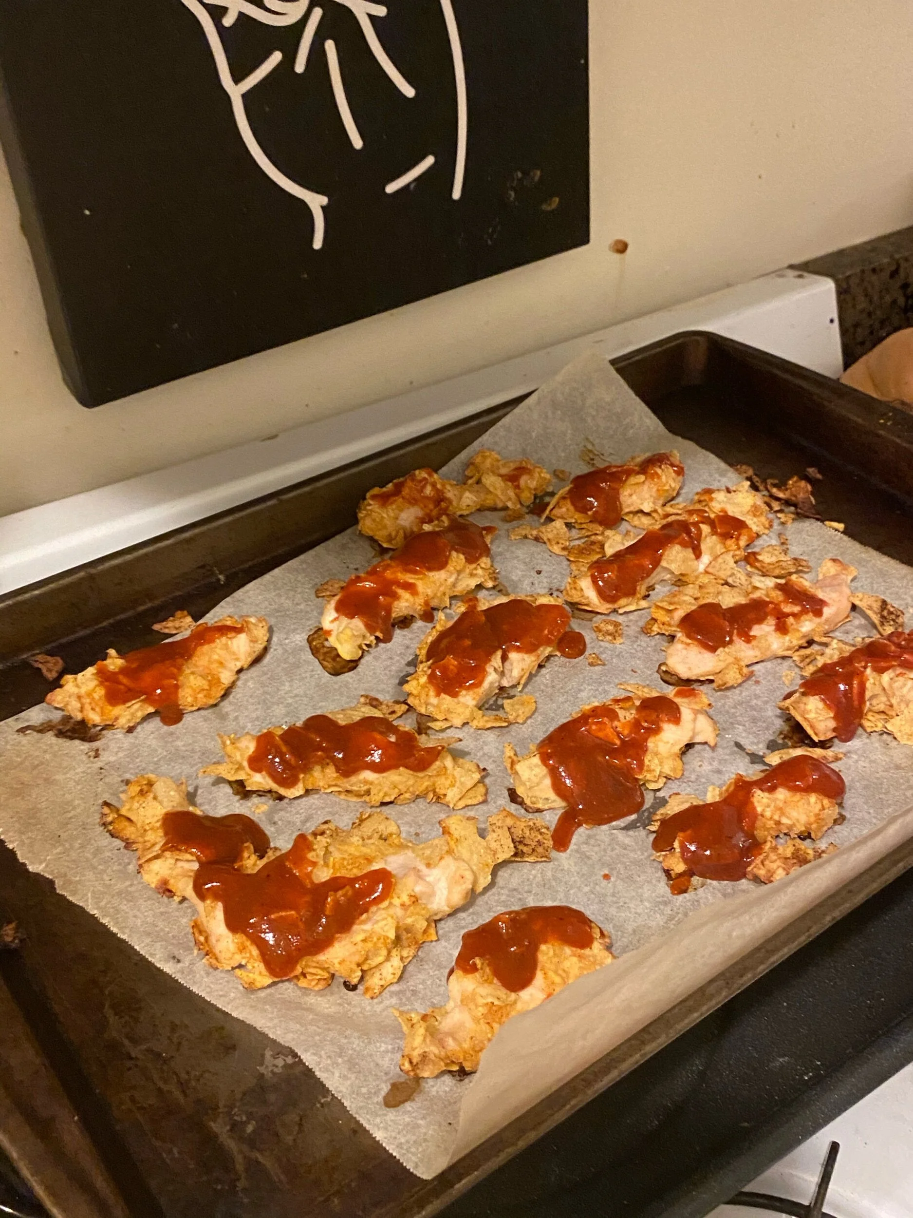 Mix your bbq sauce and brush the chicken individually in sauce. Pick up each piece and turn over in the bowl of the sauce and place on your platter.