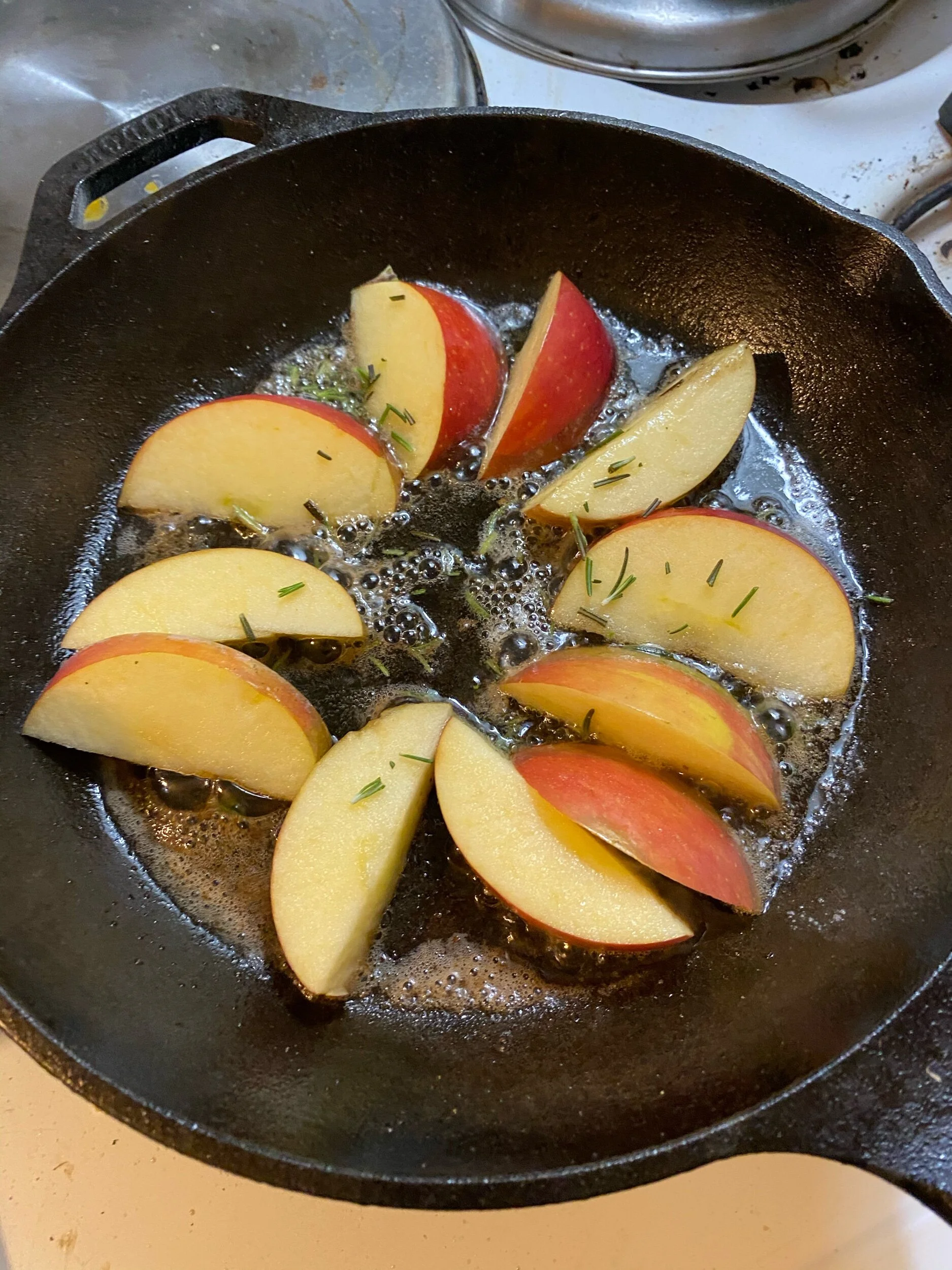Finely dice the Rosemary and sprinkle over the apple slices.