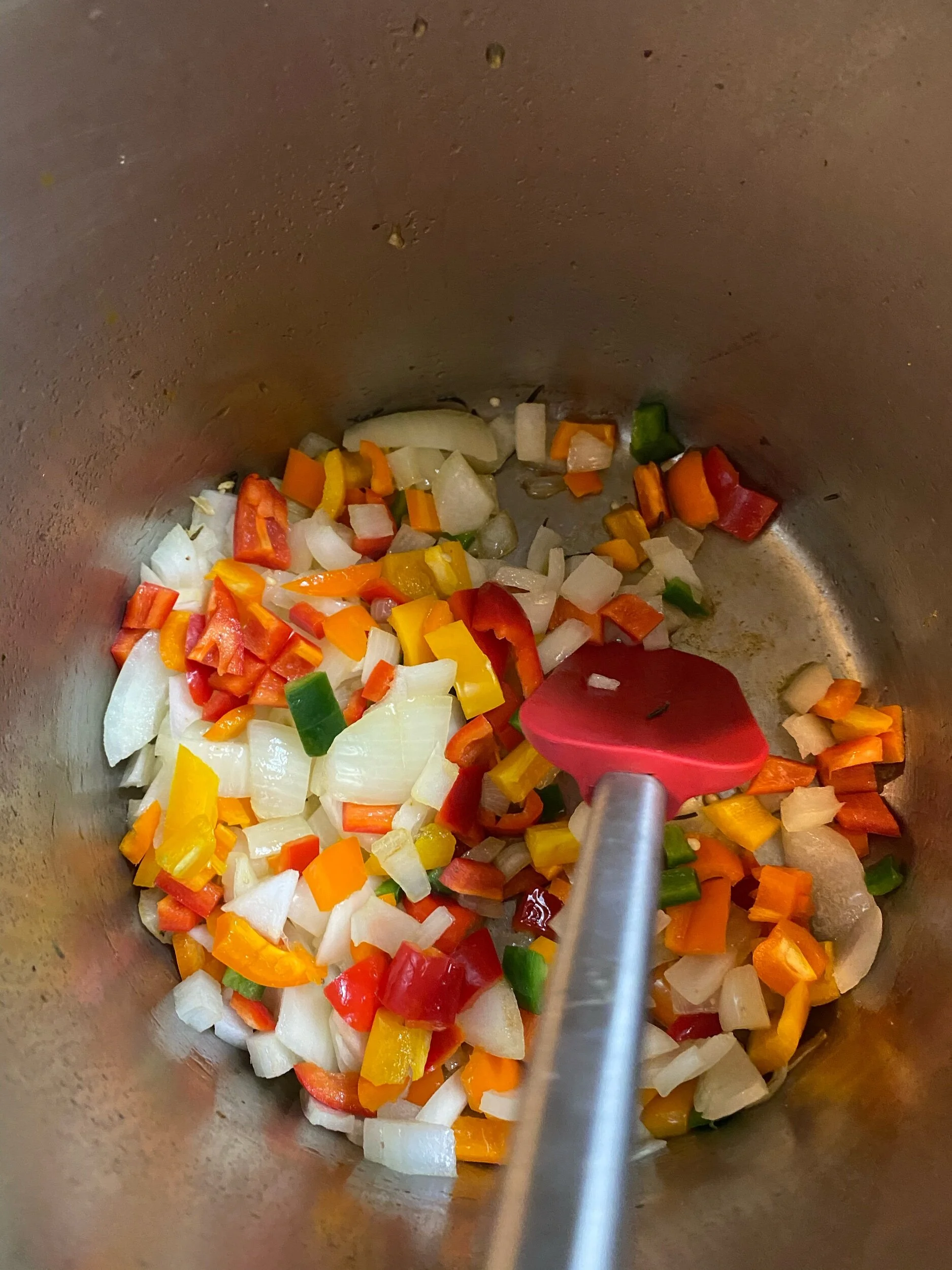 Dice your onions, peppers, jalapeños (if you’re using) and garlic cloves. Add olive oil to your deep bottomed pot and add the onions. When they become aromatic, add the peppers and garlic. Add the remaining spice mixture directly to the vegetables, …