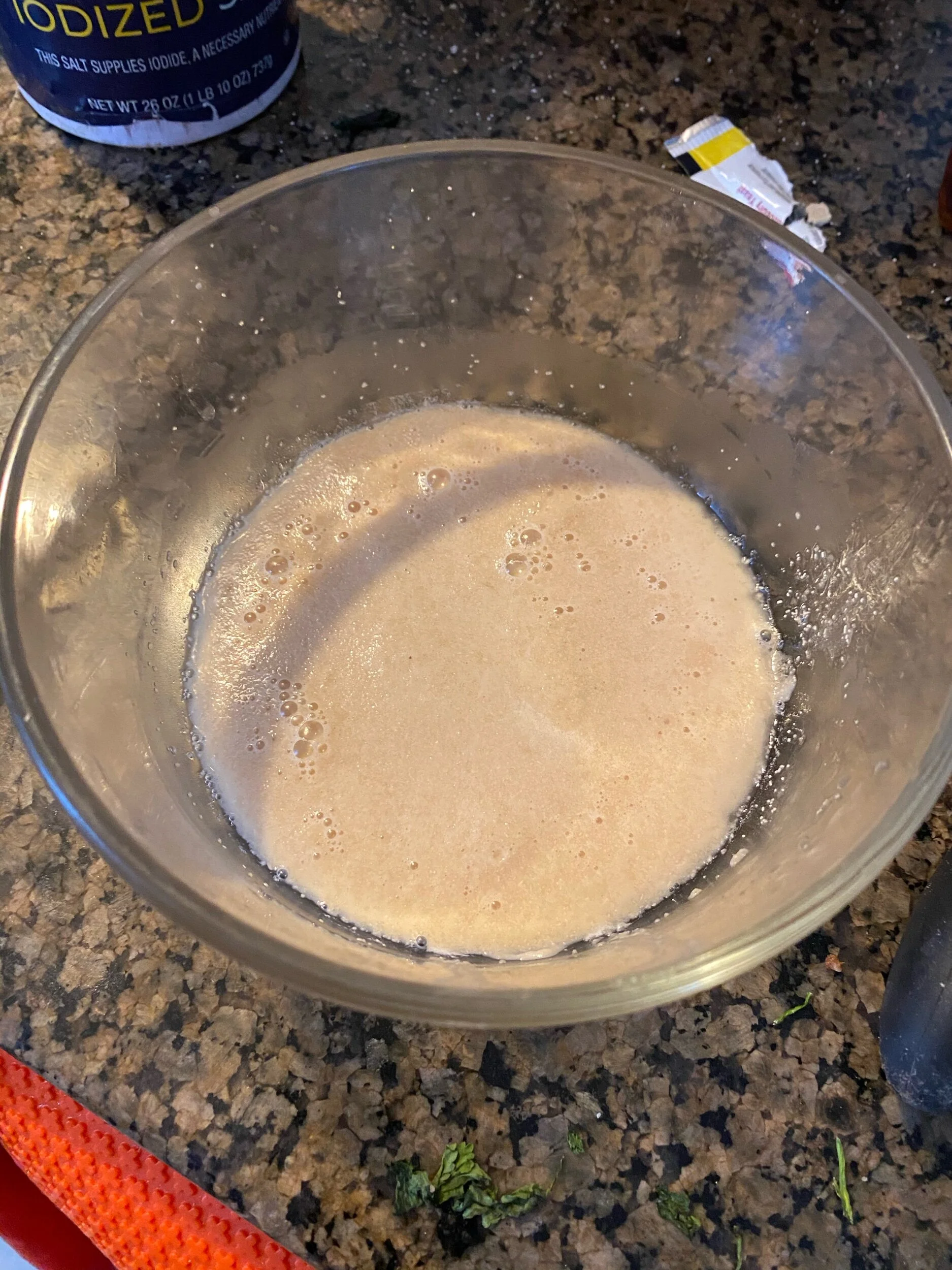 Foam your yeast. Place 0.5 cup of water in a bowl and add 2 tbls of barley malt syrup (or honey, molasses etc) and your yeast packet. Let the foam rise to the top of the bowl (5-11 minutes).