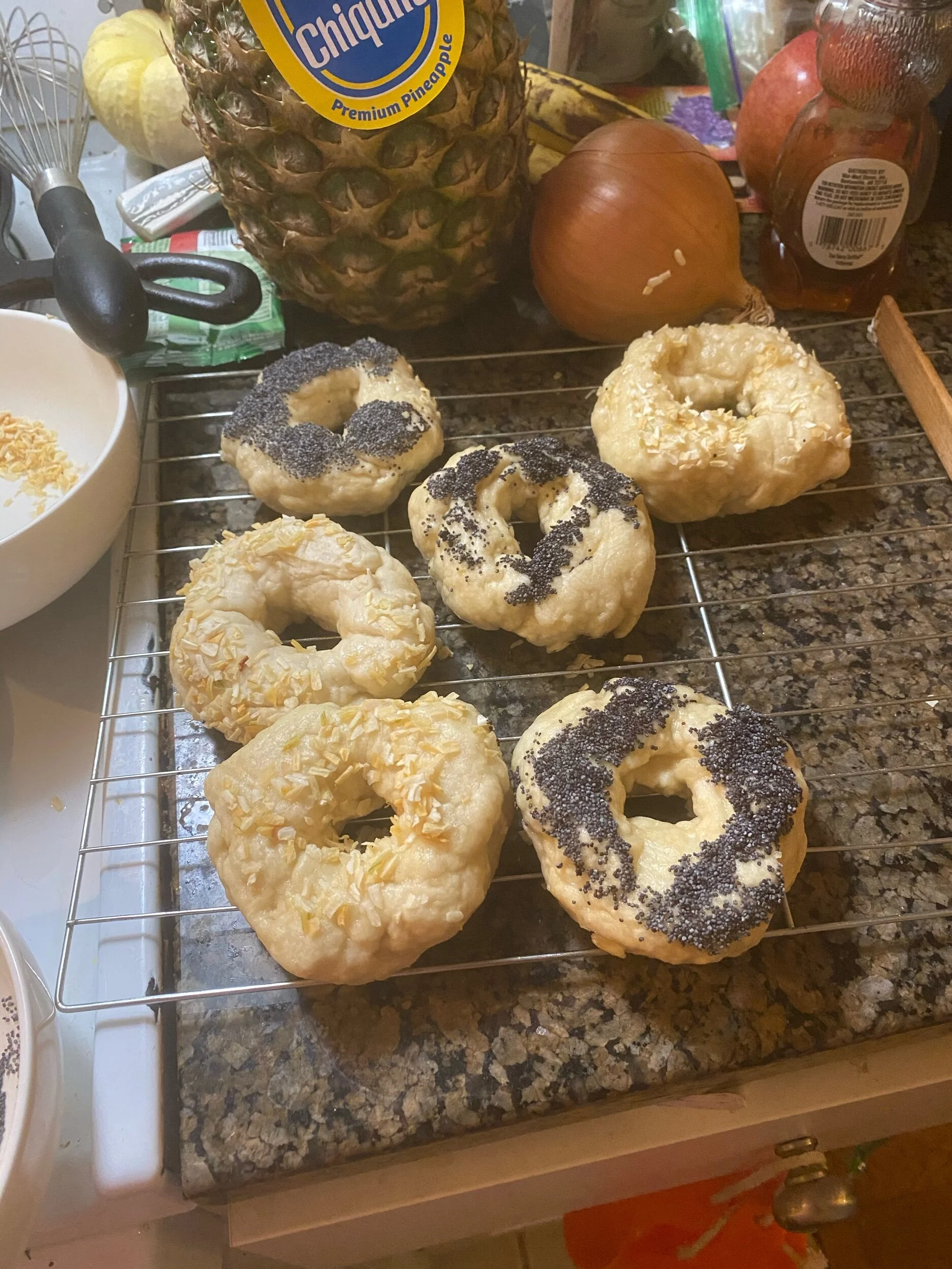 When all the bagels have boiled, take the still wet bagels and cover them in your desired spices/flavorings. Mine were onion and poppy seed. Place the bagels, in batches, in the oven and cook for 13-15 minutes. The NY Times recipe said to cook them …