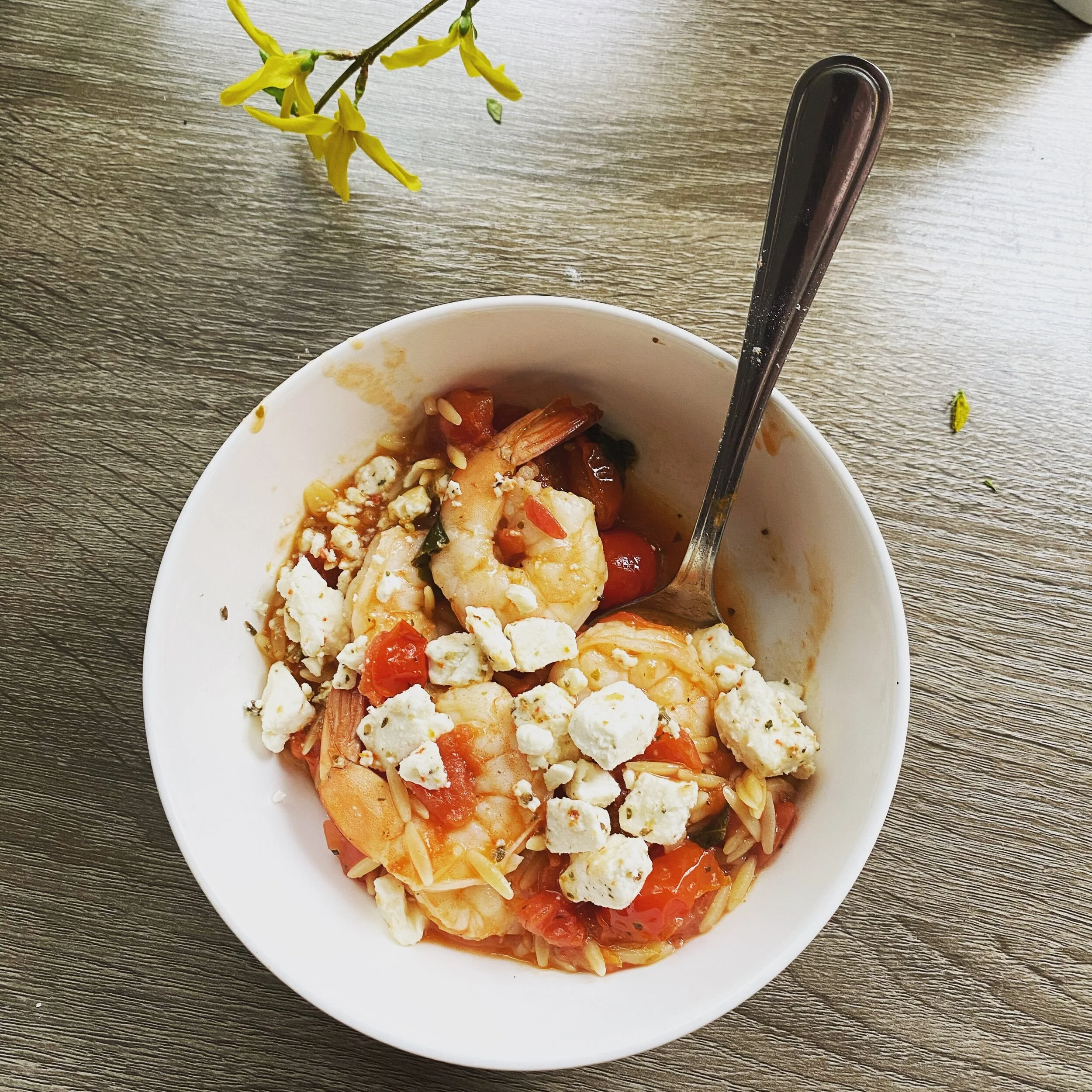 Shrimp with feta and burst tomatoes