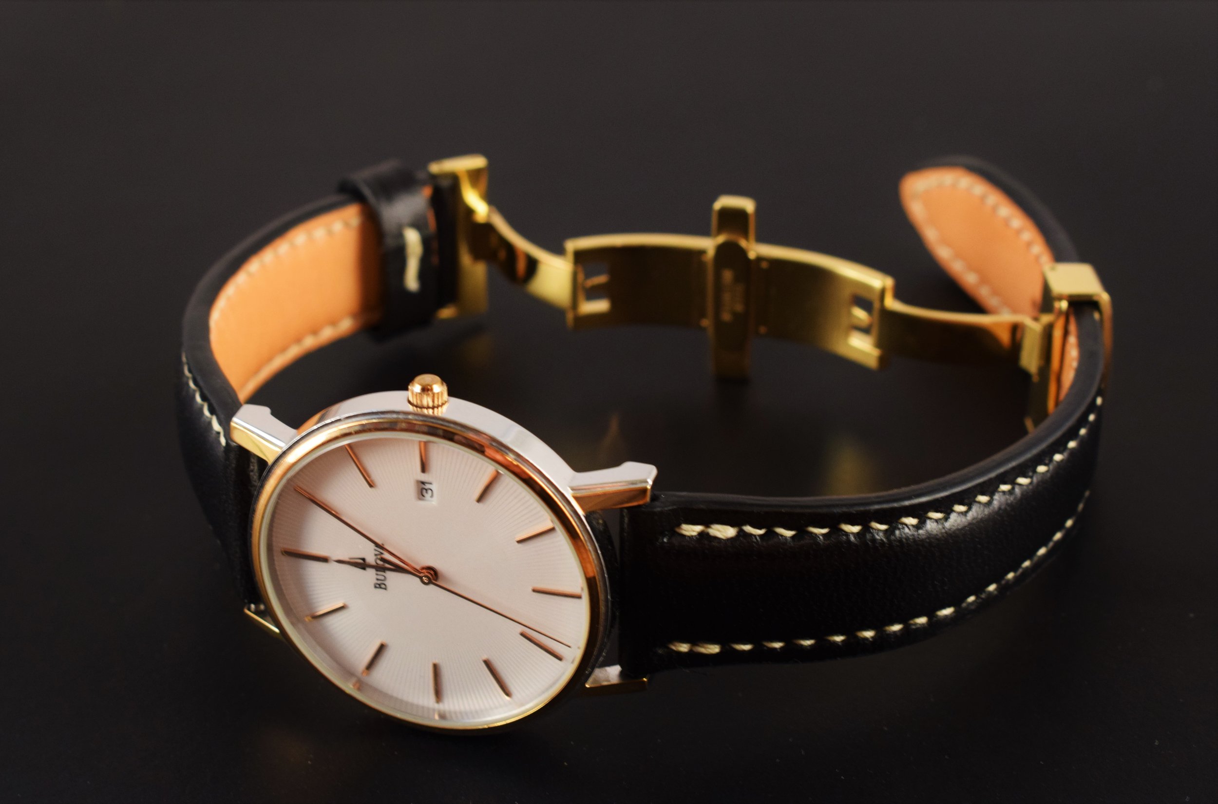 Black Italian Buttero, 20/18mm taper, Gold-Plated Deployment Clasp ($145)
