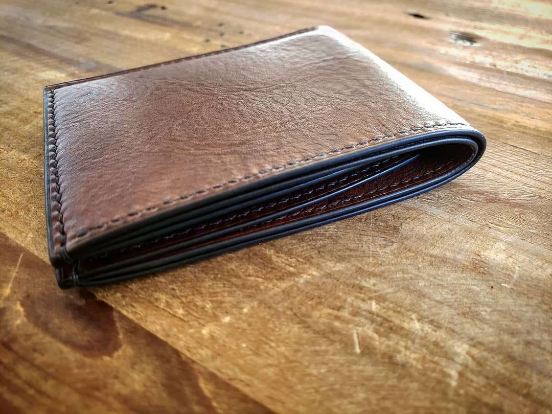 One of the wallets now available for purchase through www.homageleatherworks.com. 
Check it out along with several other new options. 

#smallbusiness #handmade #wallet #billfold #natural #rustic #classic