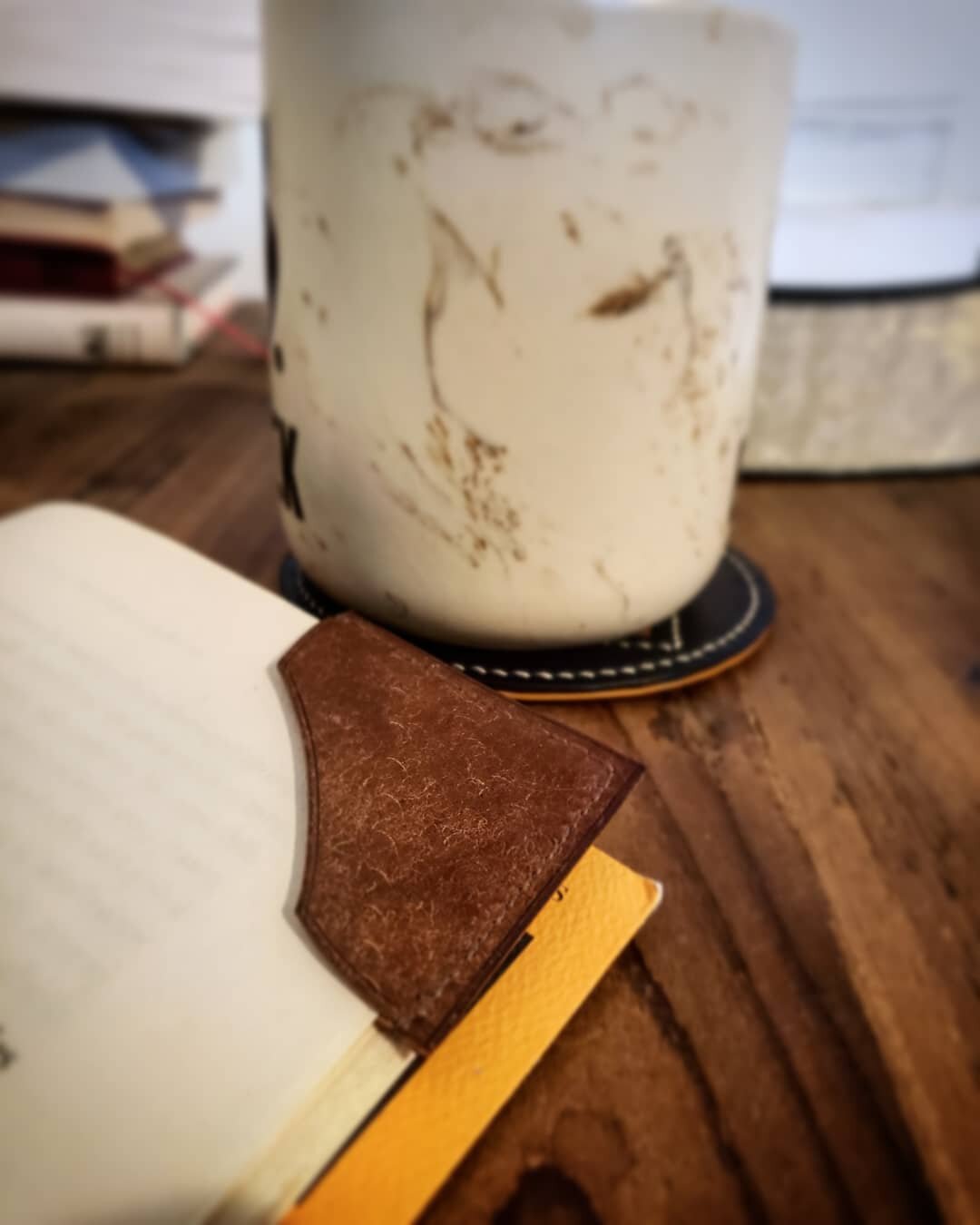 Always easy to pick up where I left off. 

#bookmark #simple #reading #morning #coffee #quiettime #relaxing #goodstart #leather #coaster #leatherwork