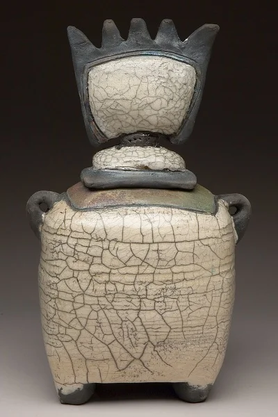 Raku vessel with rattle 10"h, 6 1/2" w, 4"d
