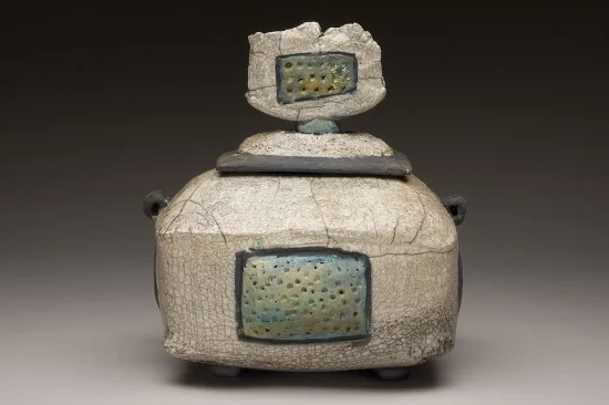 Raku lidded vessel with rattle 7" h, 6 1/2" w, 4"d