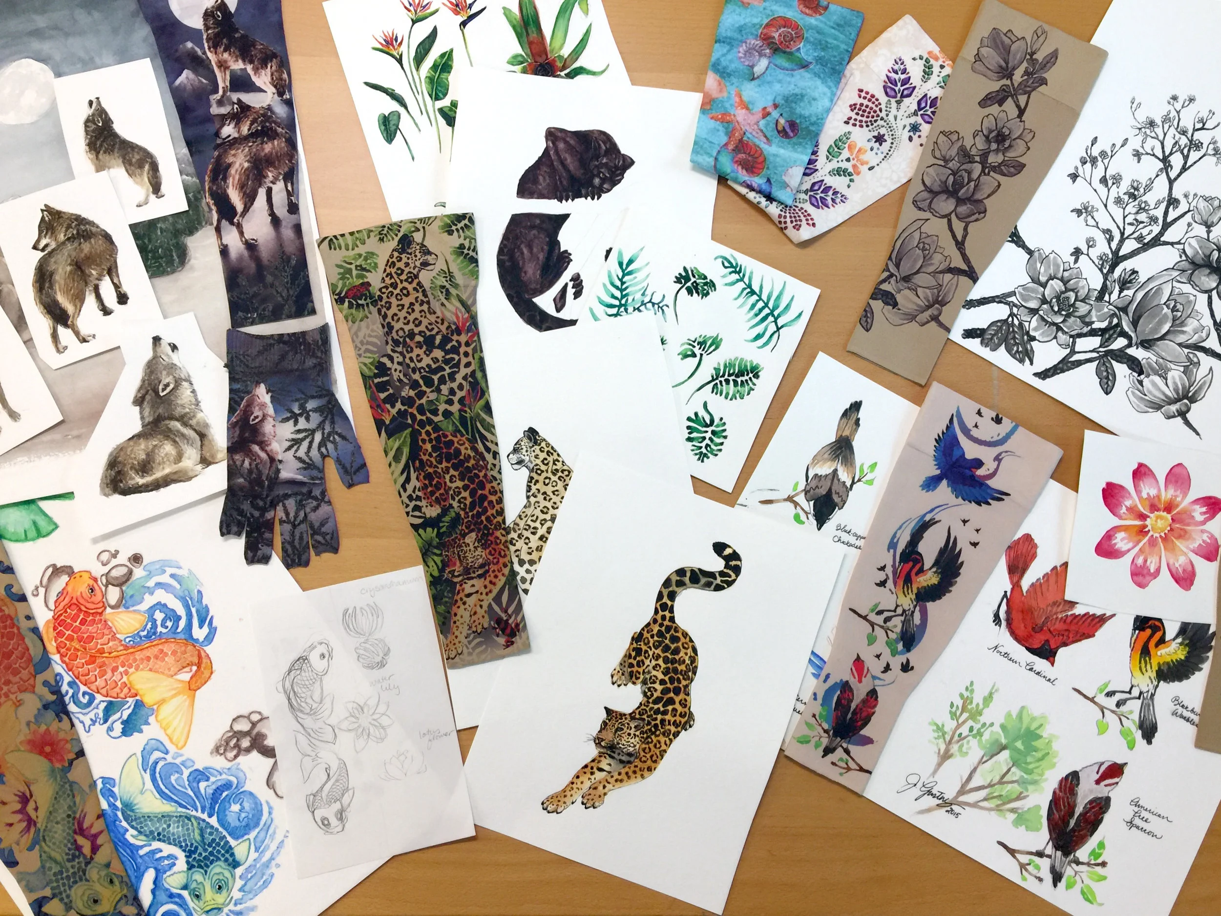 A variety of patterns that include paintings in their design.