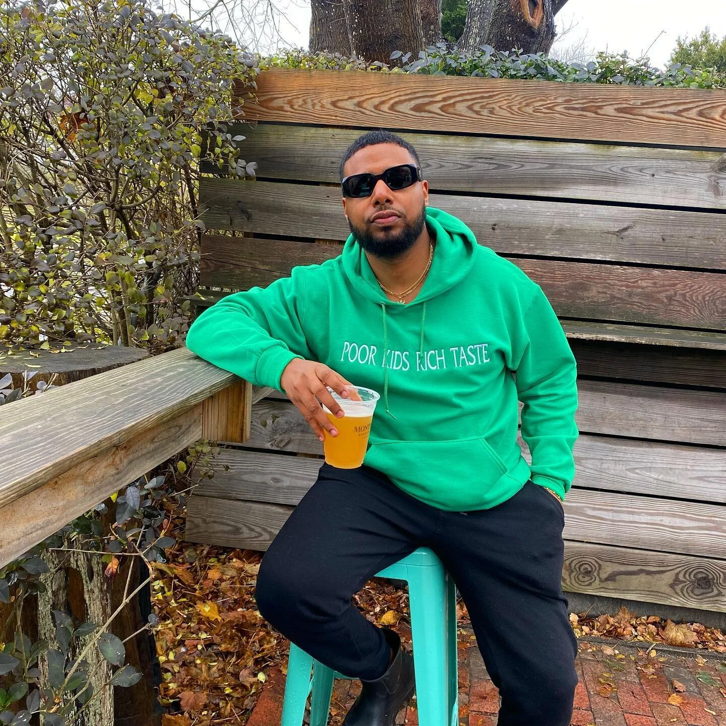 @buenosworld in the Kelly green &ldquo; POOR KIDS RICH TASTE &ldquo; hoodie . 

Available on wethebanditsnyc.com