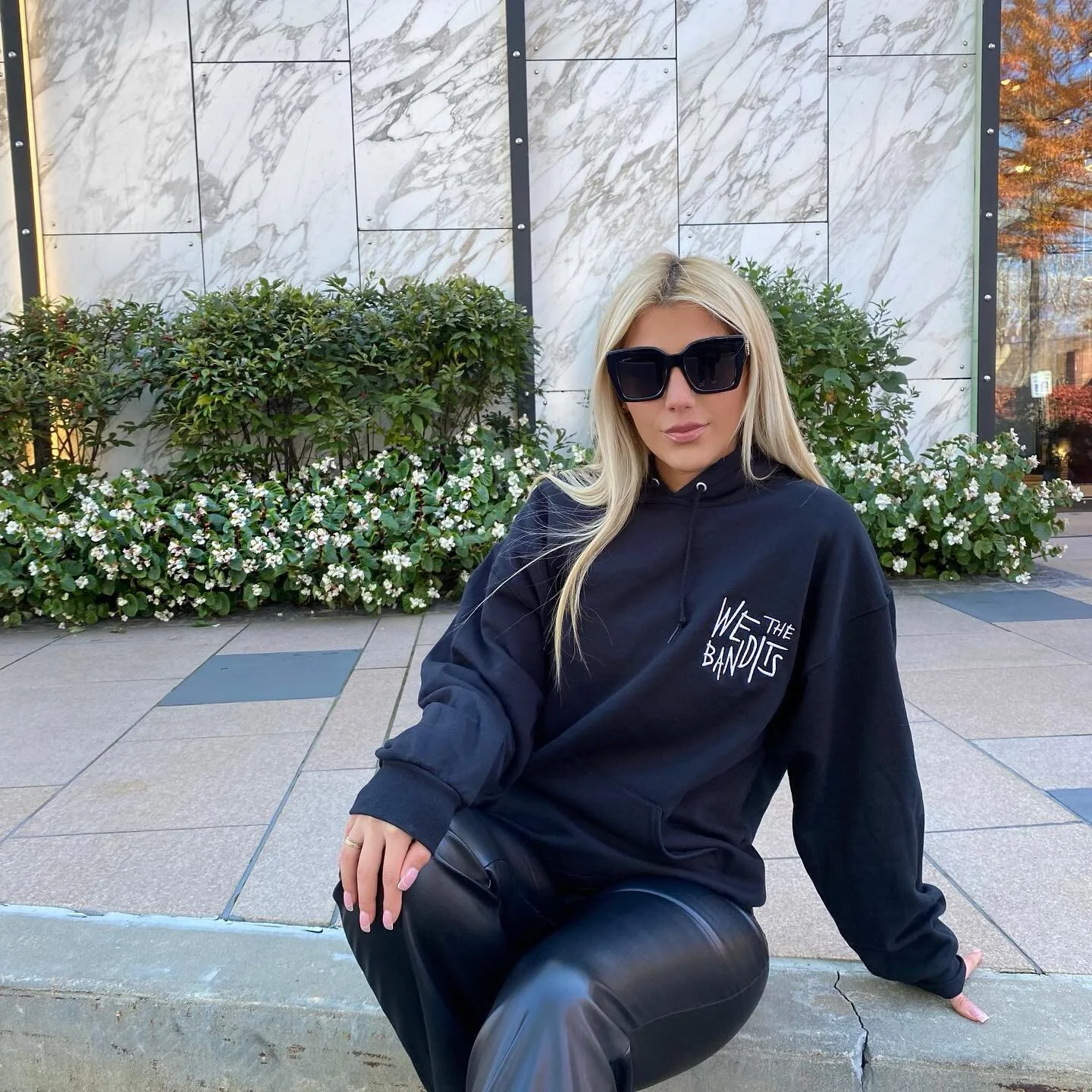 Black embroidered logo hoodie dropping this week.