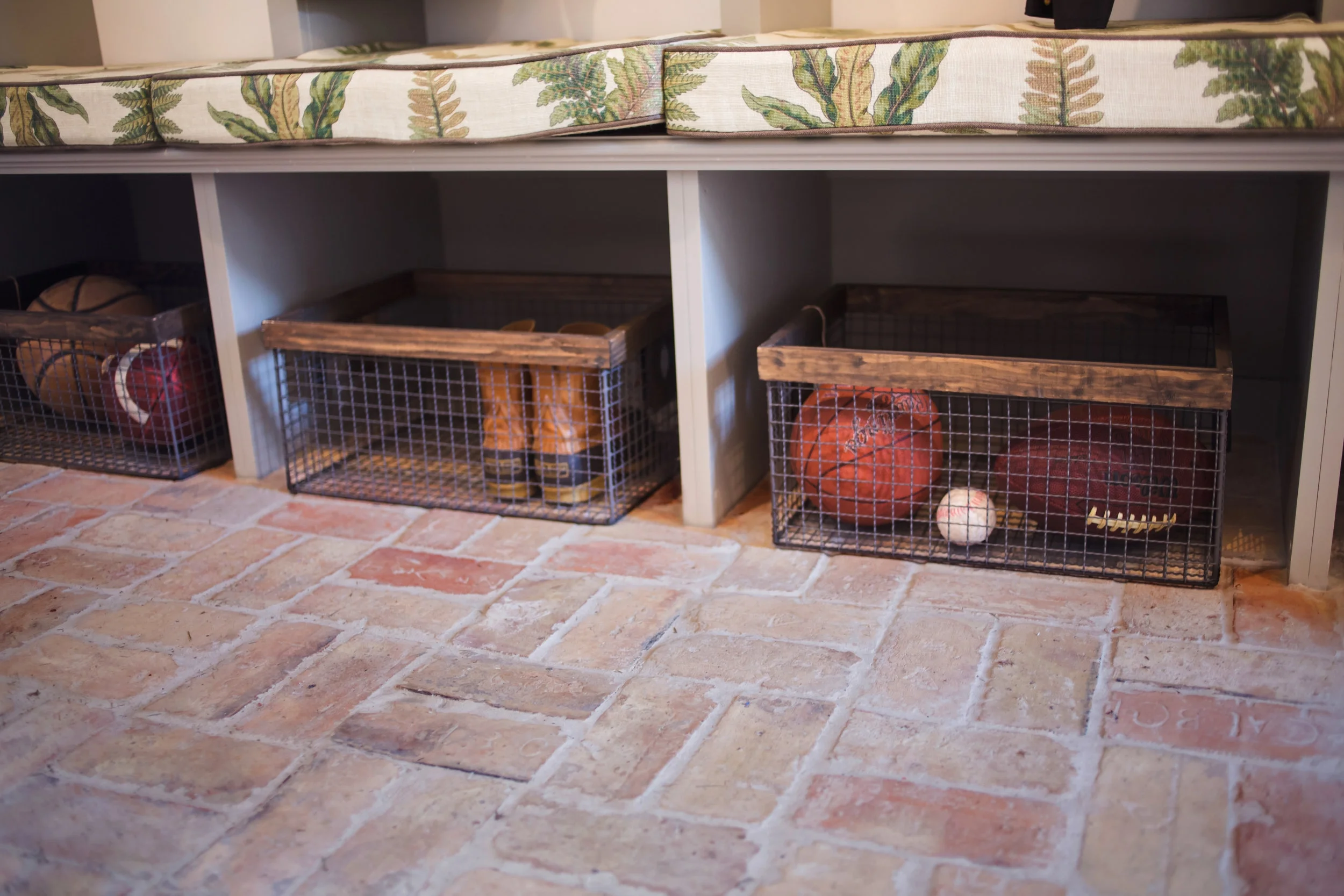 ellebrightDesigns.mudroom.brickfloor.cubbies