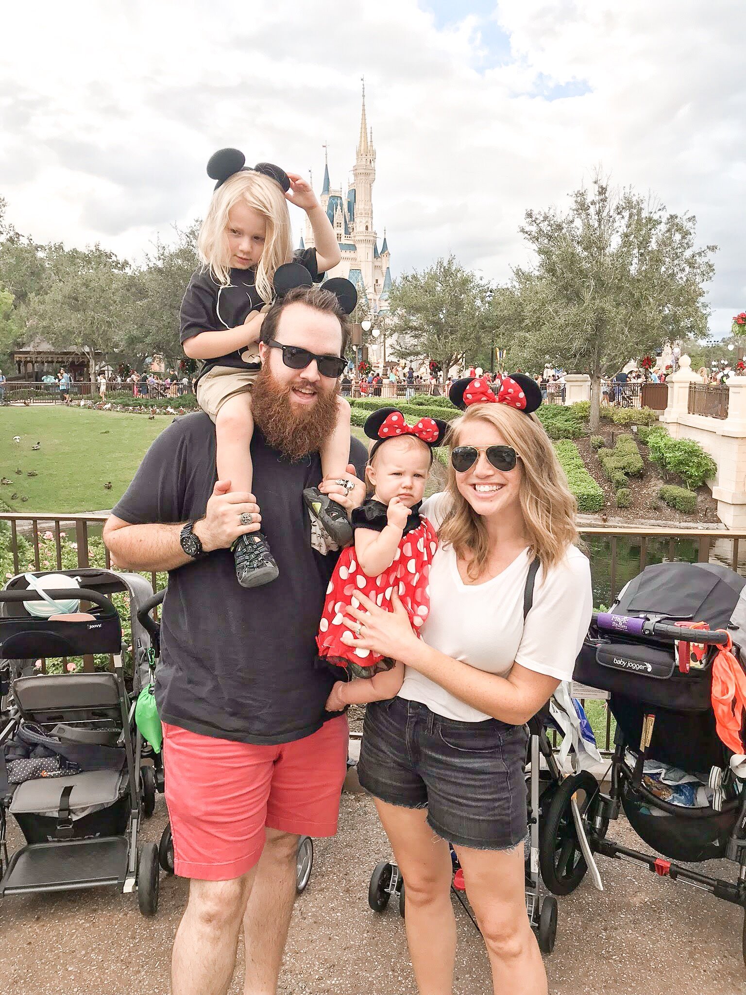 White Vneck t-shirt // Black Cutoff Shorts // Sandals // Sunglasses // Backpack // Family Ears
