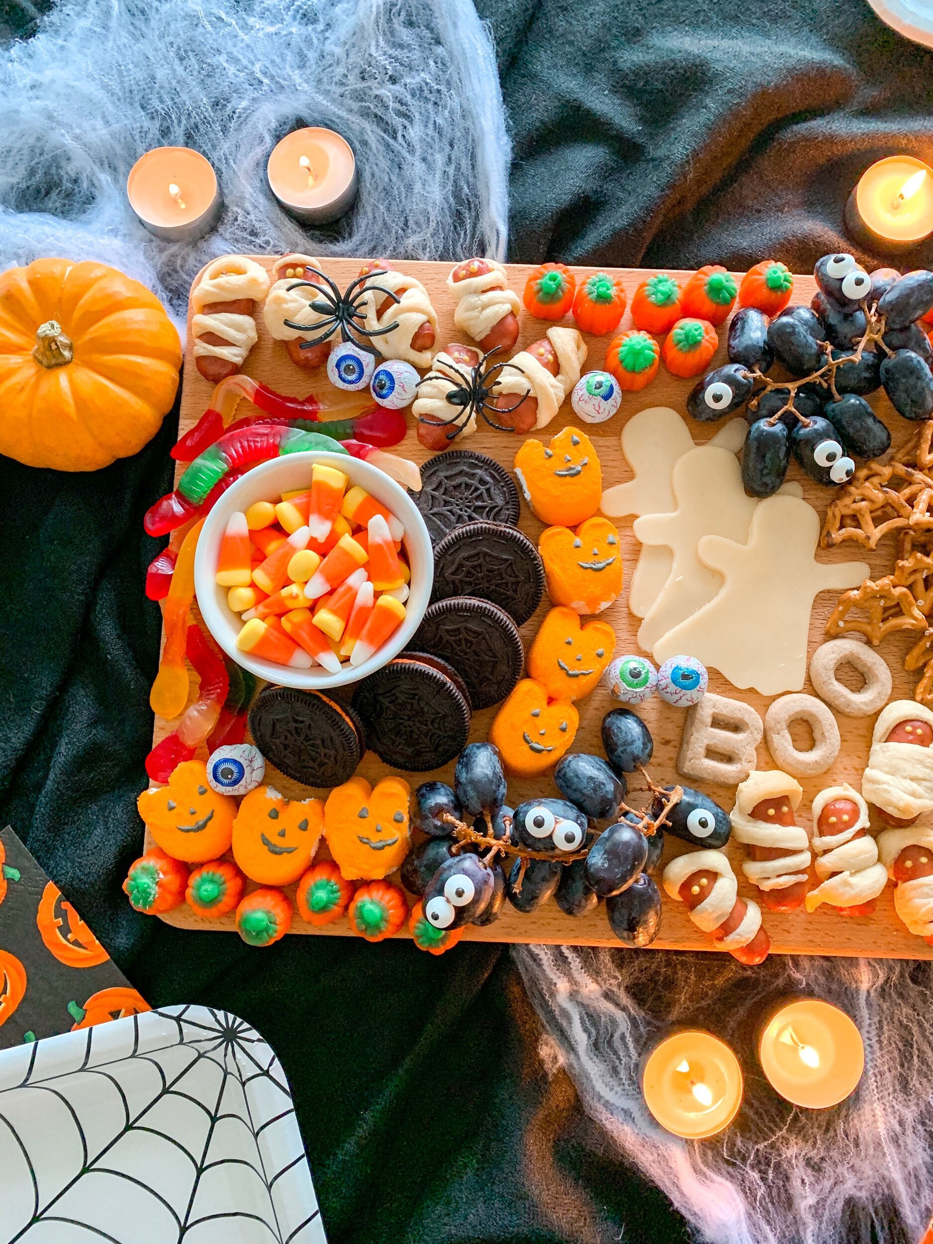 My favorite touch for a Halloween themed charcuterie board? Add candy eyes for a fun, monster-like feel to any treat!