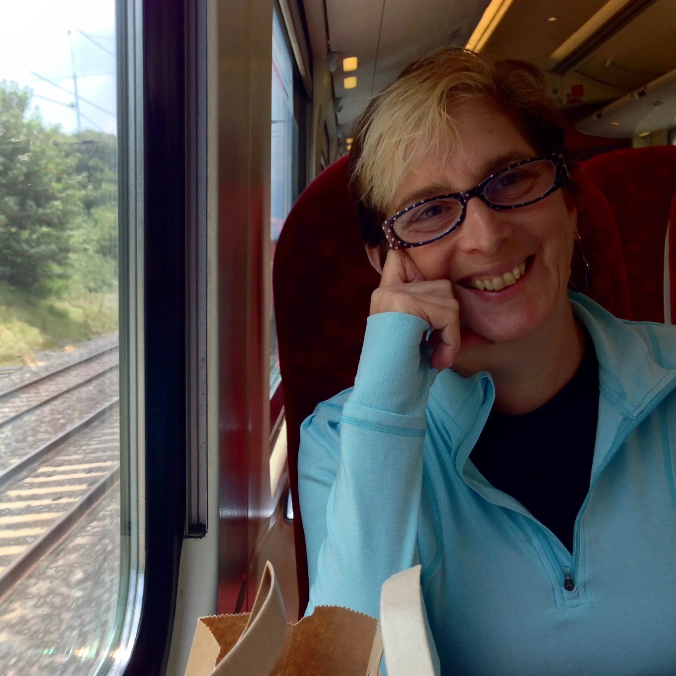 Sue on a train