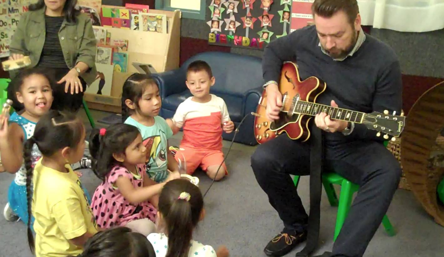 eddiewithkids.jpg