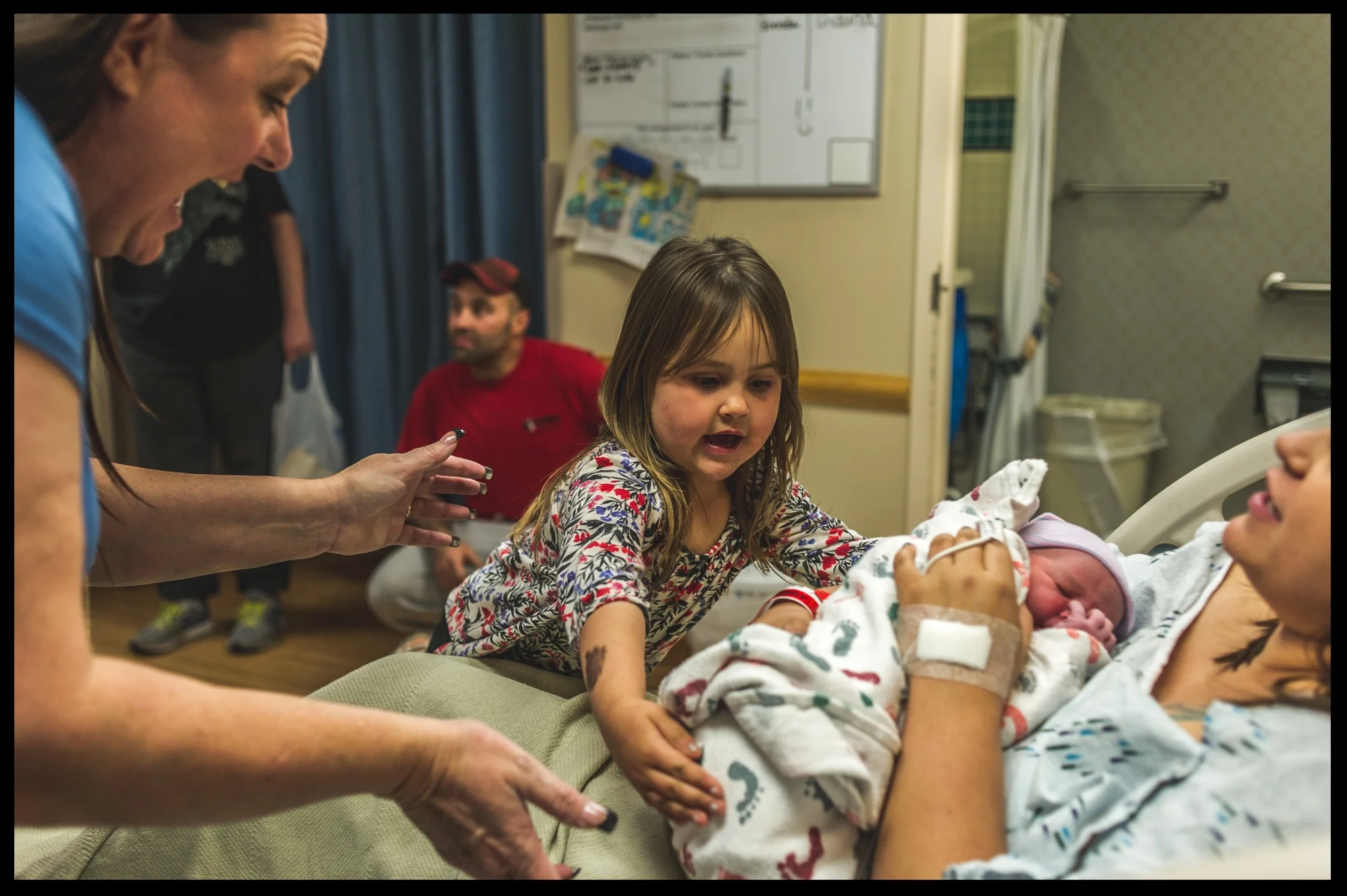 Grandmother excitedly getting ready to hold her new granddaughter, color, Stillwater, OK