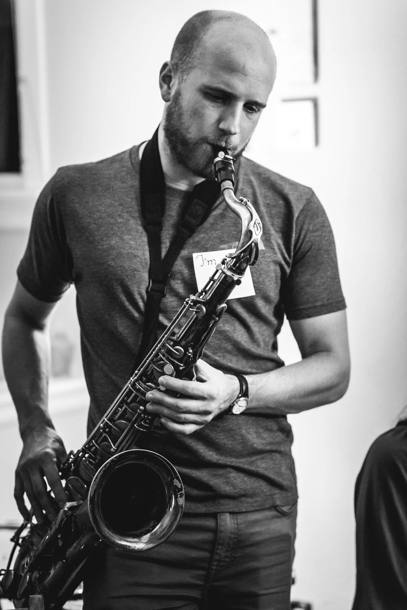 Portrait of a man playing saxophone