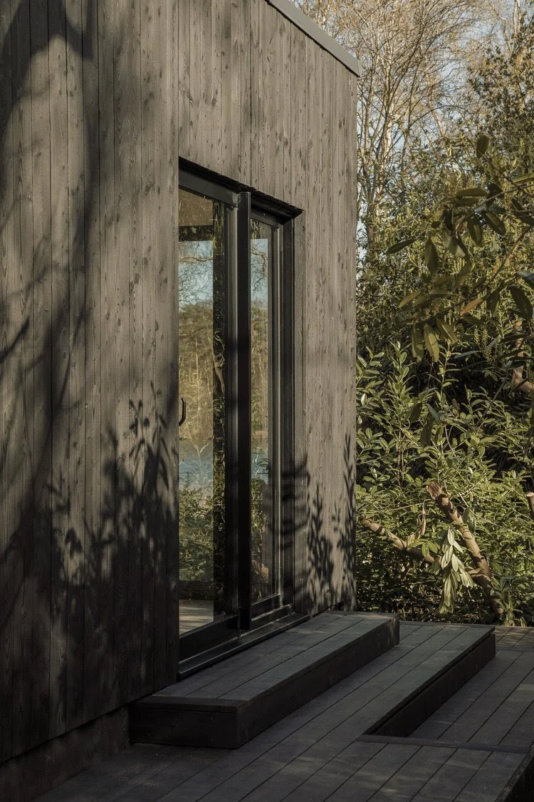 Koto cabin facade in woodland setting