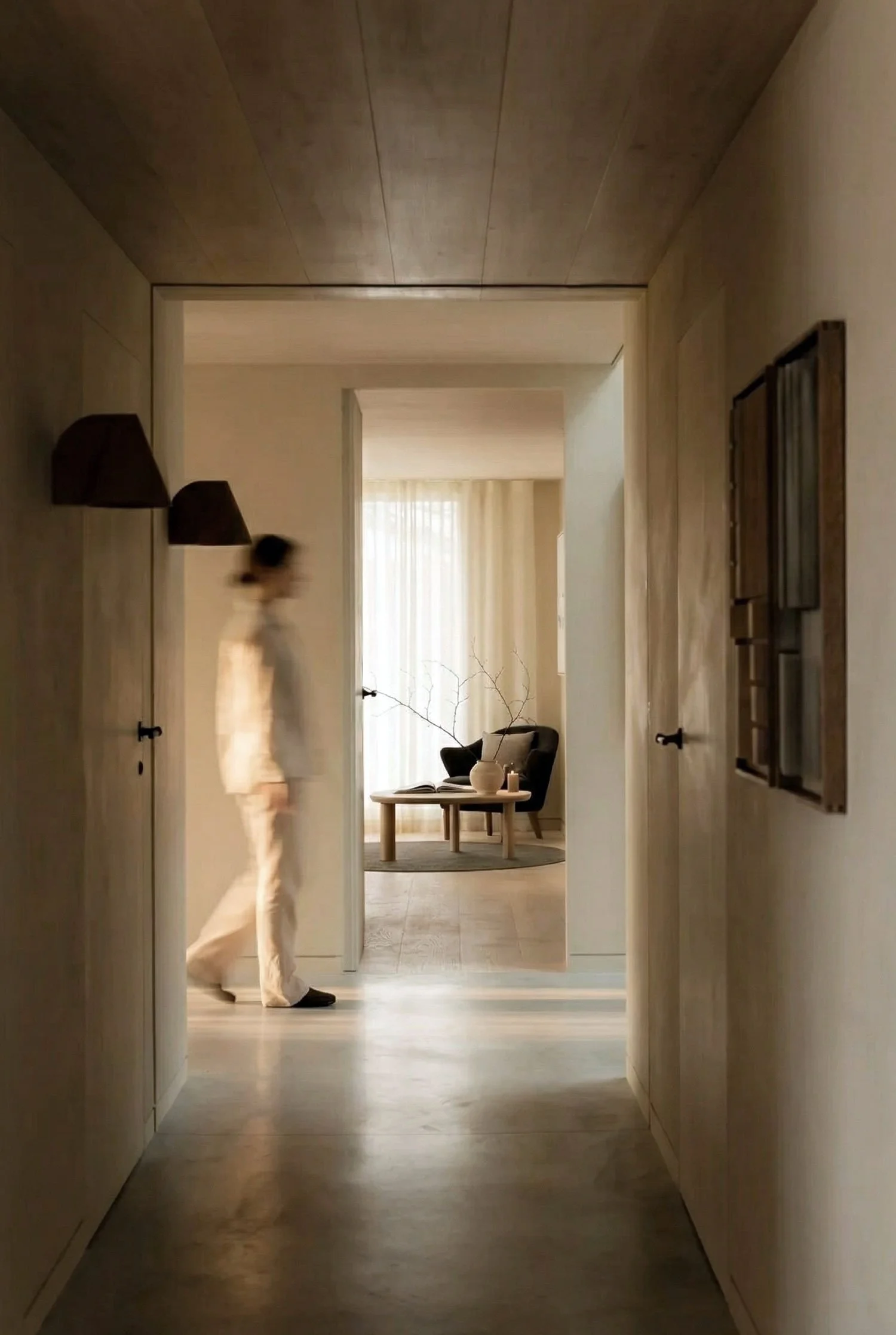 Minimal corridor interior design with warm timber finishes