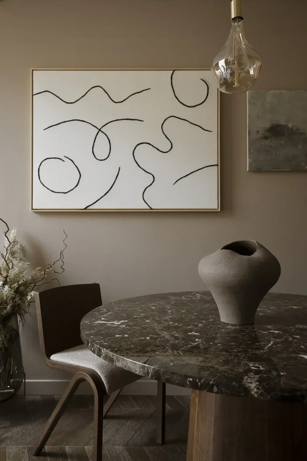 Dining furniture styling with curated pieces and warm timber tones