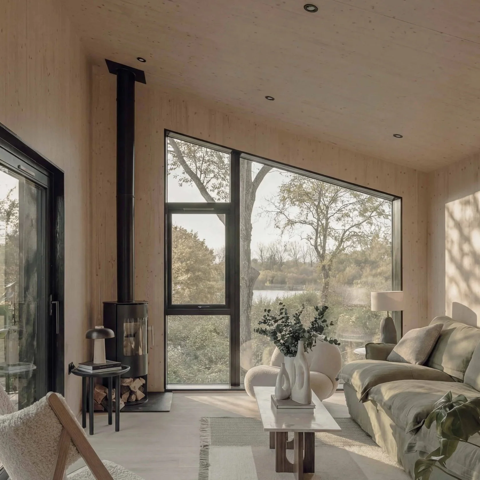 Open-plan living space at Falcon House blending interior design with the Cotswold surroundings
