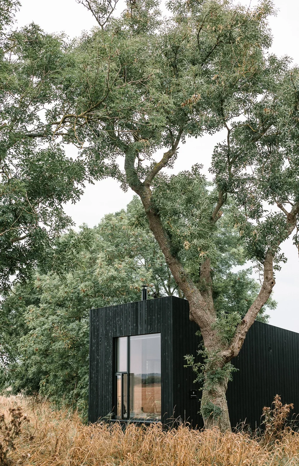 Architect-designed hotel cabin by Koto in a natural landscape