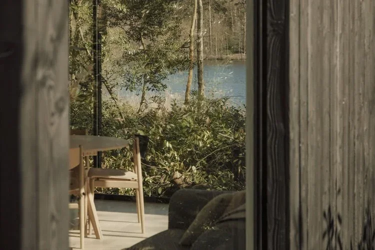 Timber spa cabin designed by Koto in a natural landscape