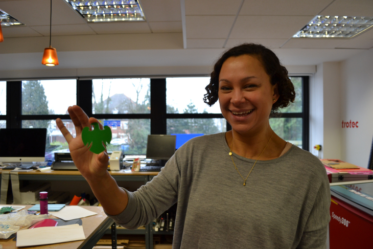 Managing Editor Laura (S) showing off a laser-cut Barclays eagle logo
