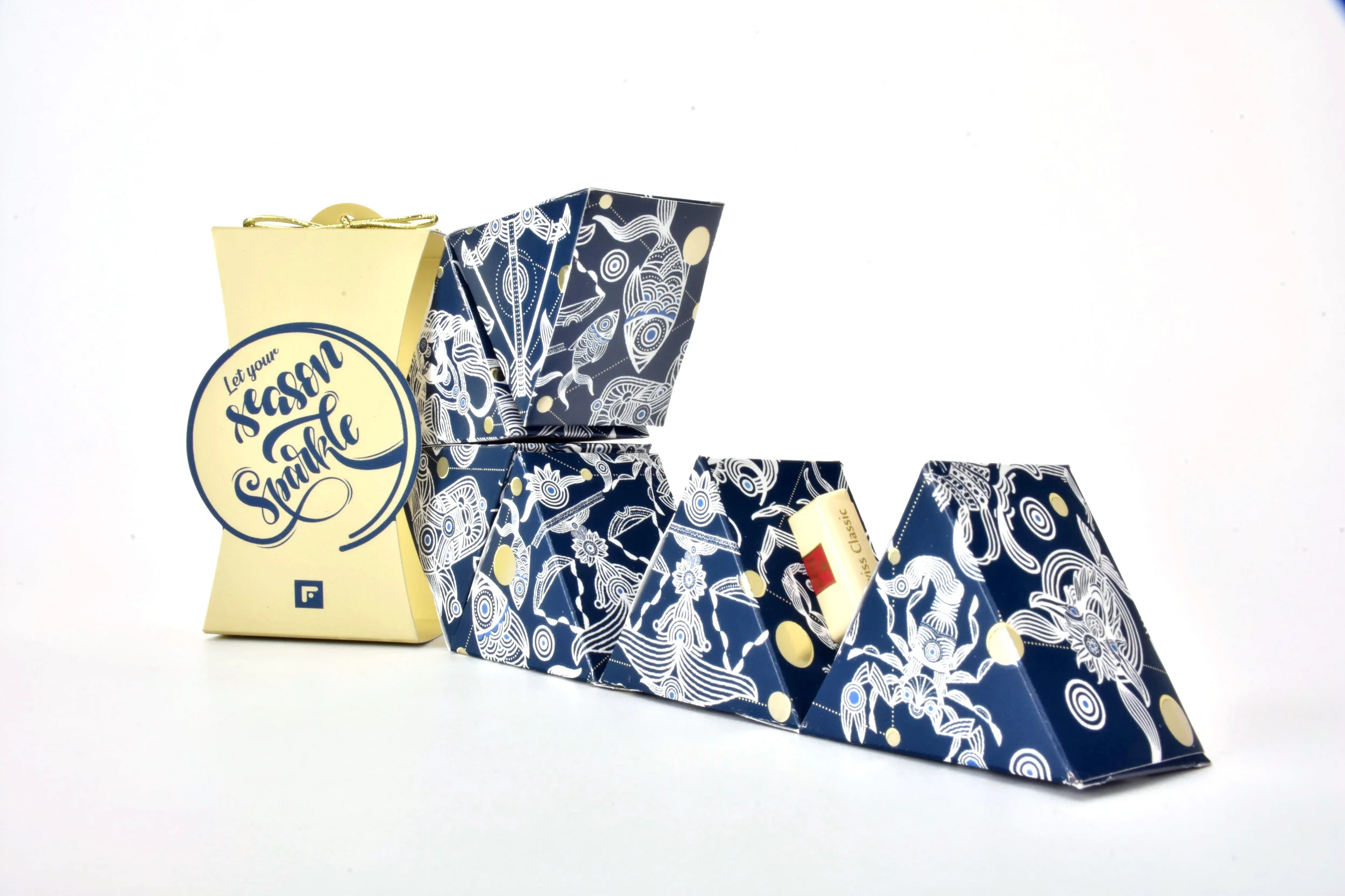  The 2016 cards represent a kaleidoscope (Kandy Scope) that has 4 different cover designs.  This year we won the best of the category award in the American Graphic Design and Advertising 31.   