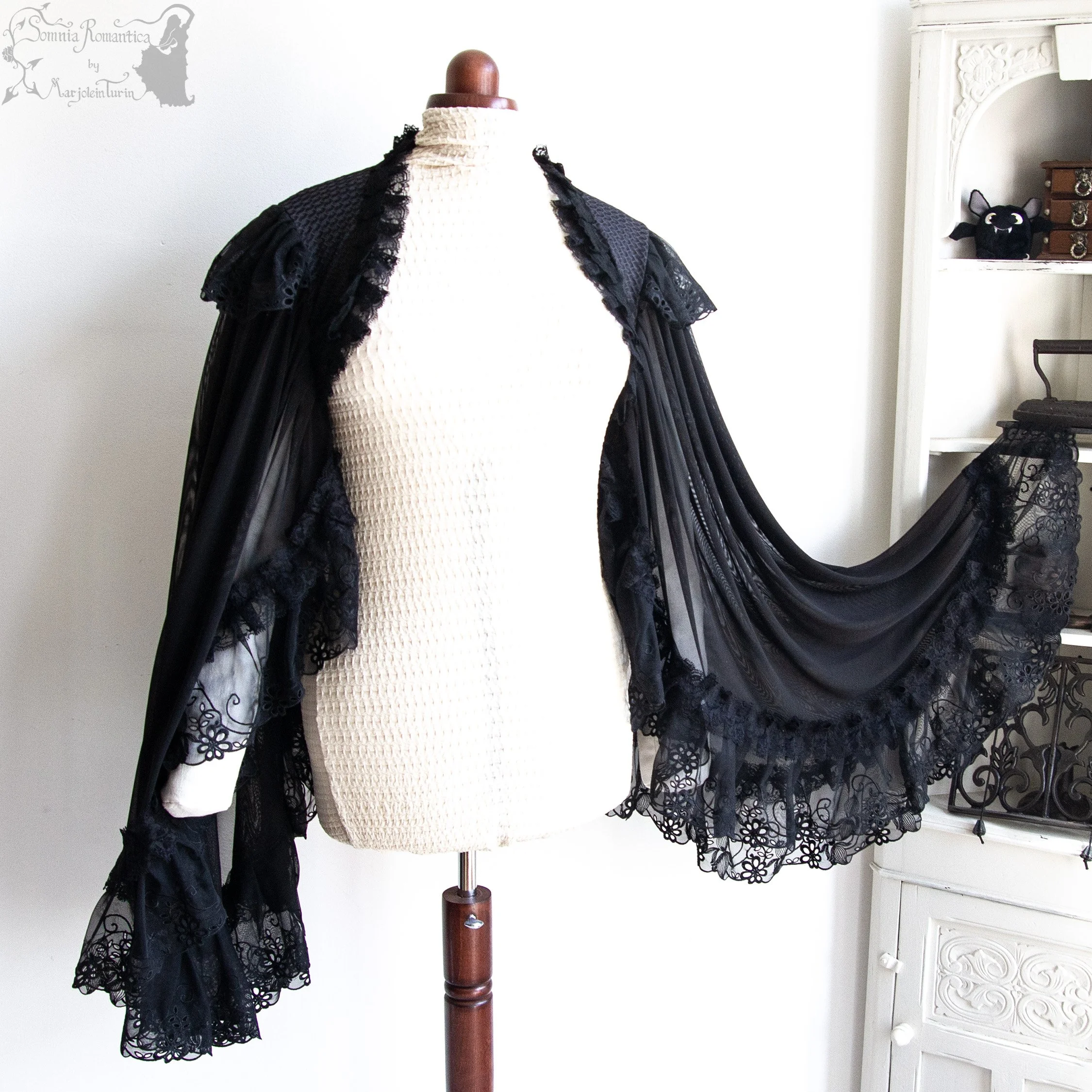 Shrug black lycra and mesh, 2X-4X, sundry designs 2026
