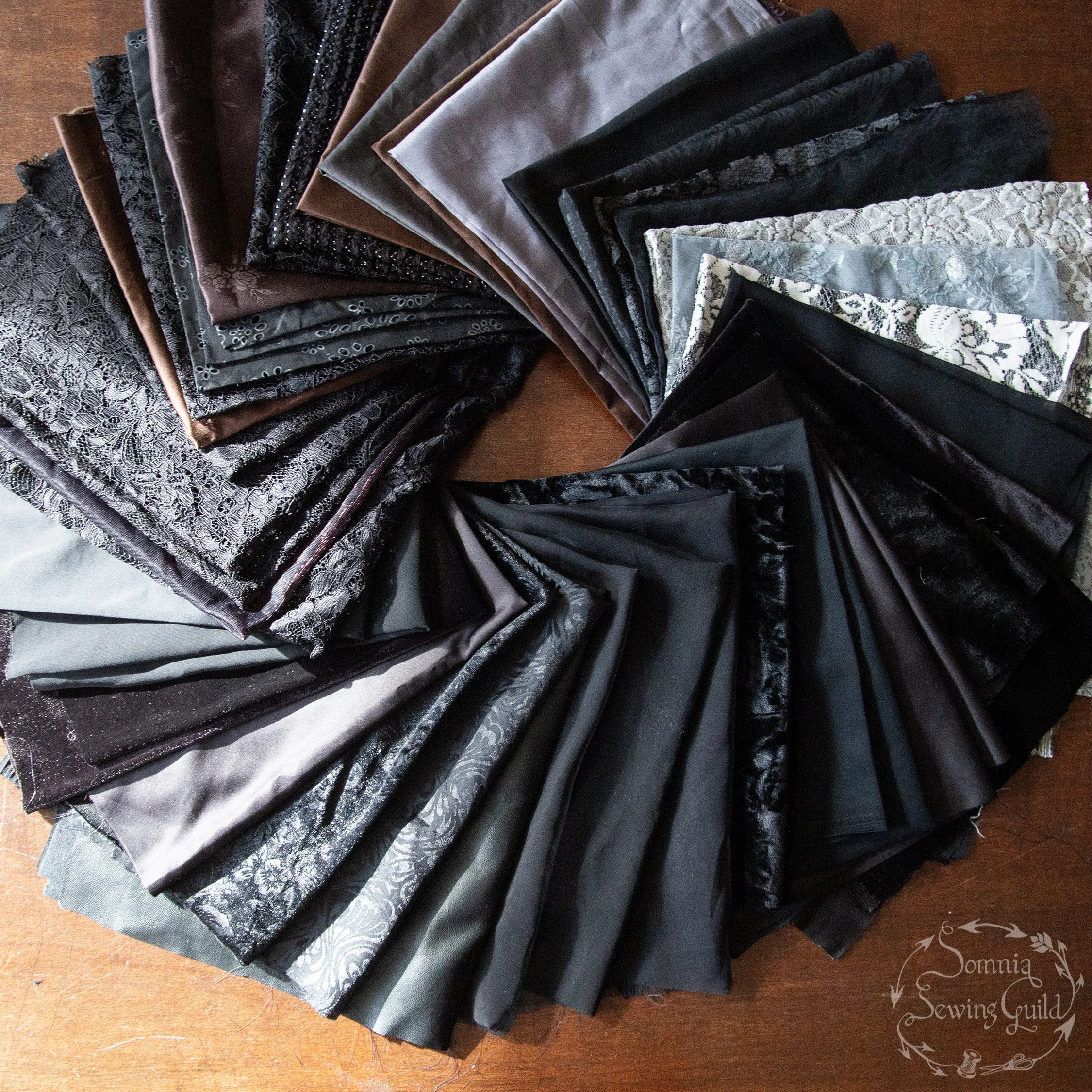 Bundle of fabric, blacks, grey, brown, 20 x 22 inch, fat quarters