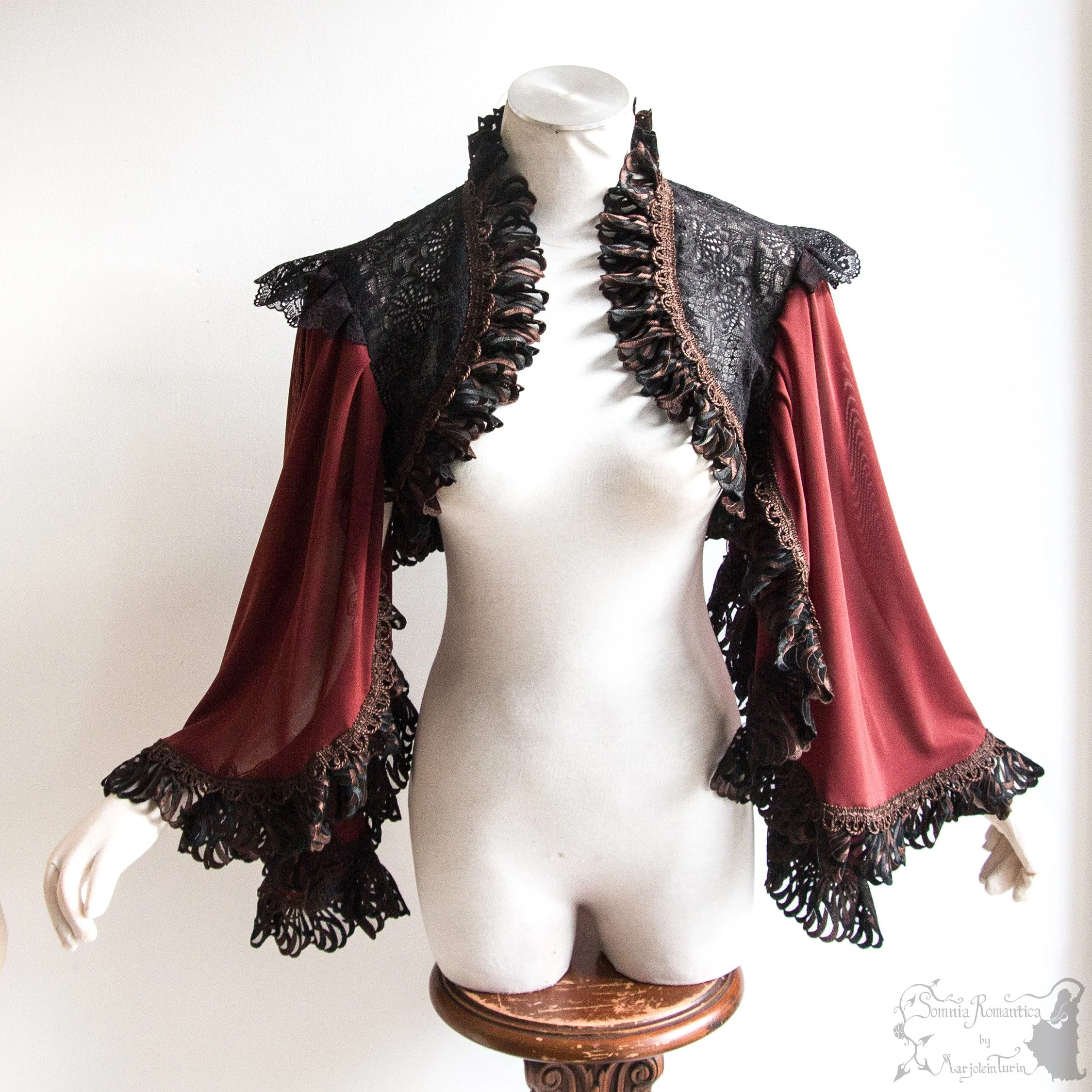 Winged shrug oxblood brown black, XL-2X, sundry designs 2025